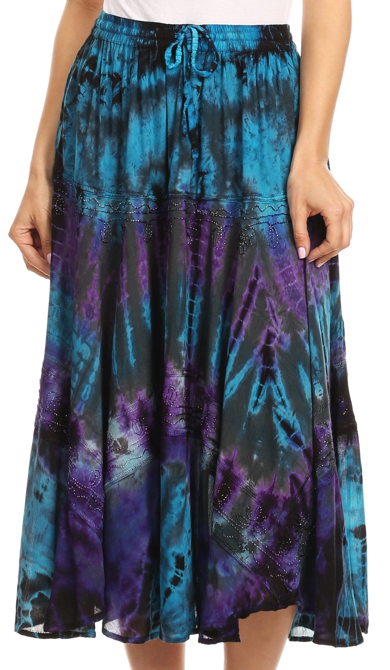 Tie-dye skirt with blue and purple patterns worn by a person