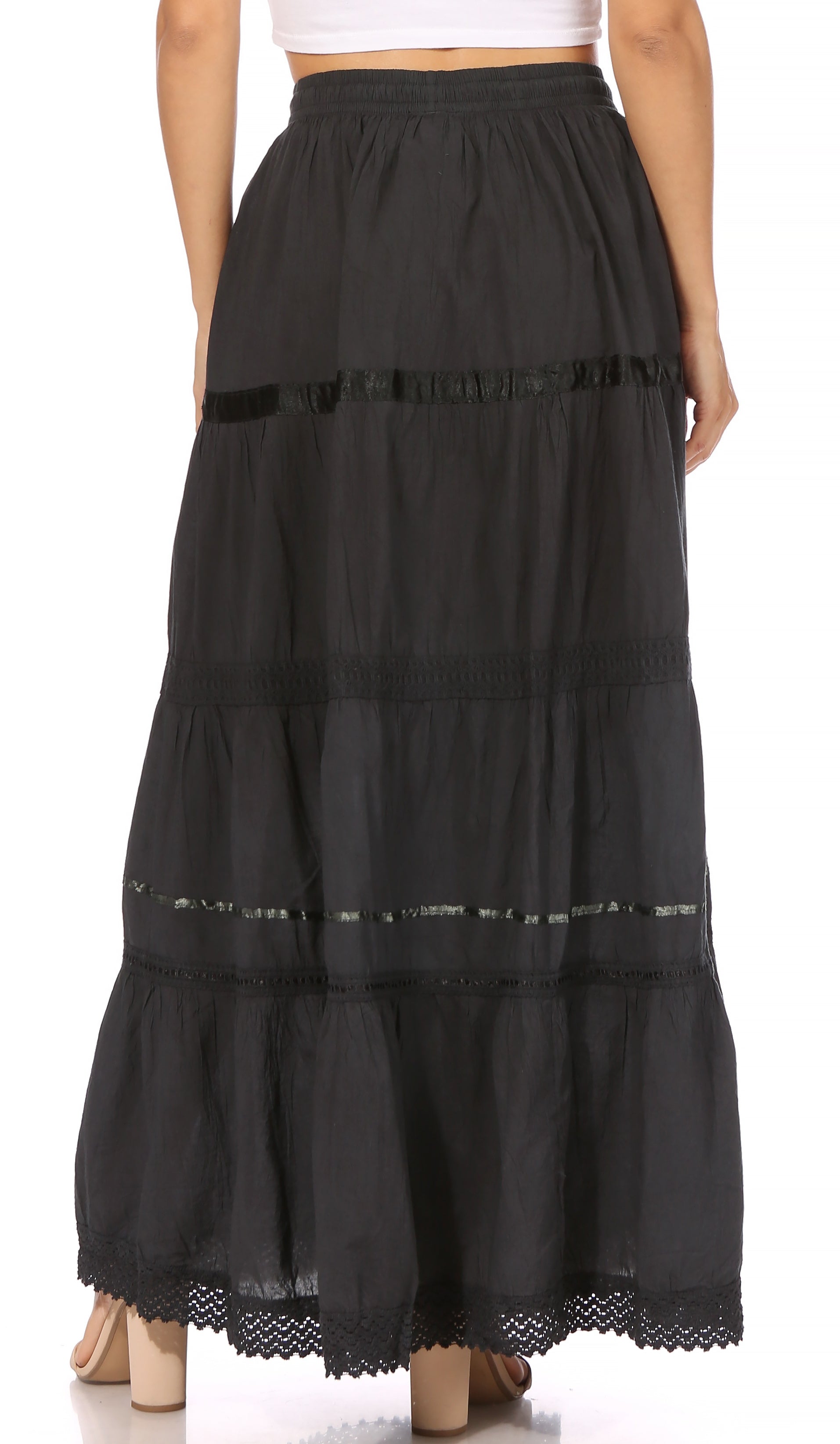 Black tiered skirt with lace details on a white background