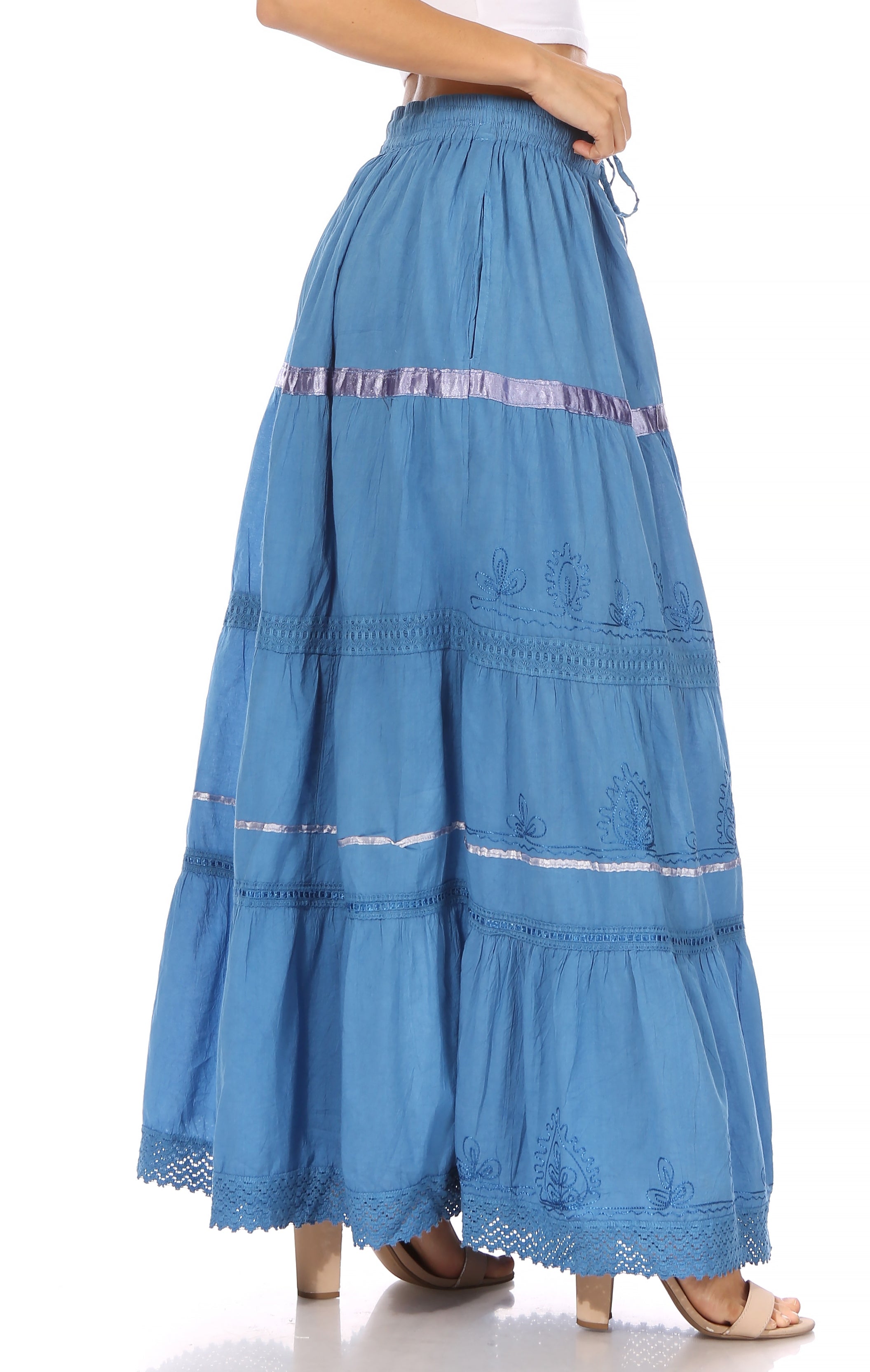 Blue tiered skirt with lace details on a white background