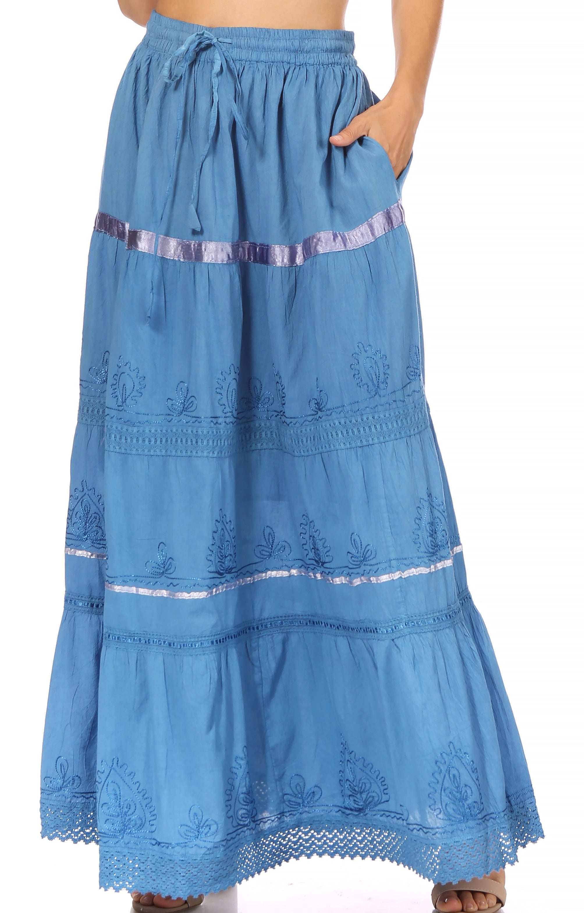 Blue embroidered skirt with a white background