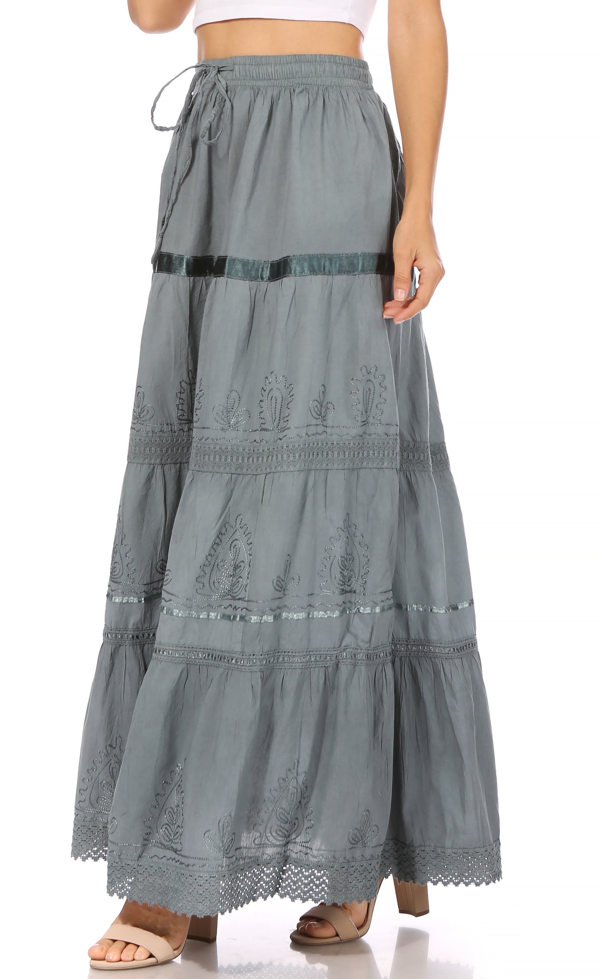 Long gray skirt with lace details on a white background