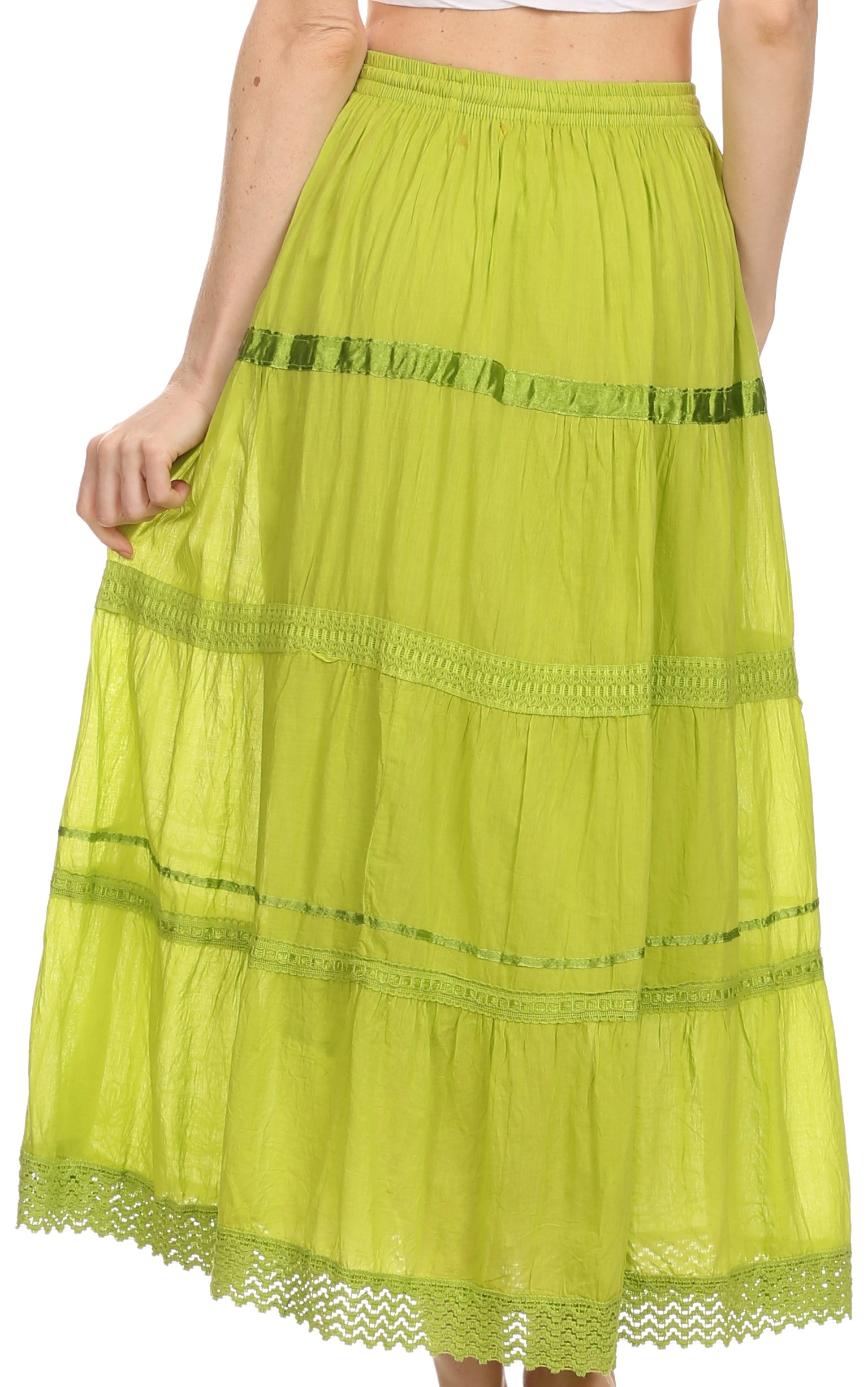 Green tiered skirt with lace details on a white background