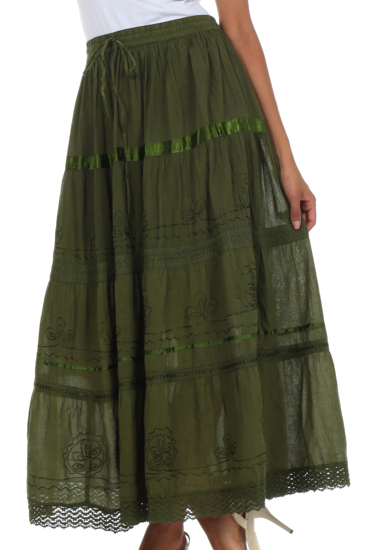 Green tiered skirt with lace details on a white background