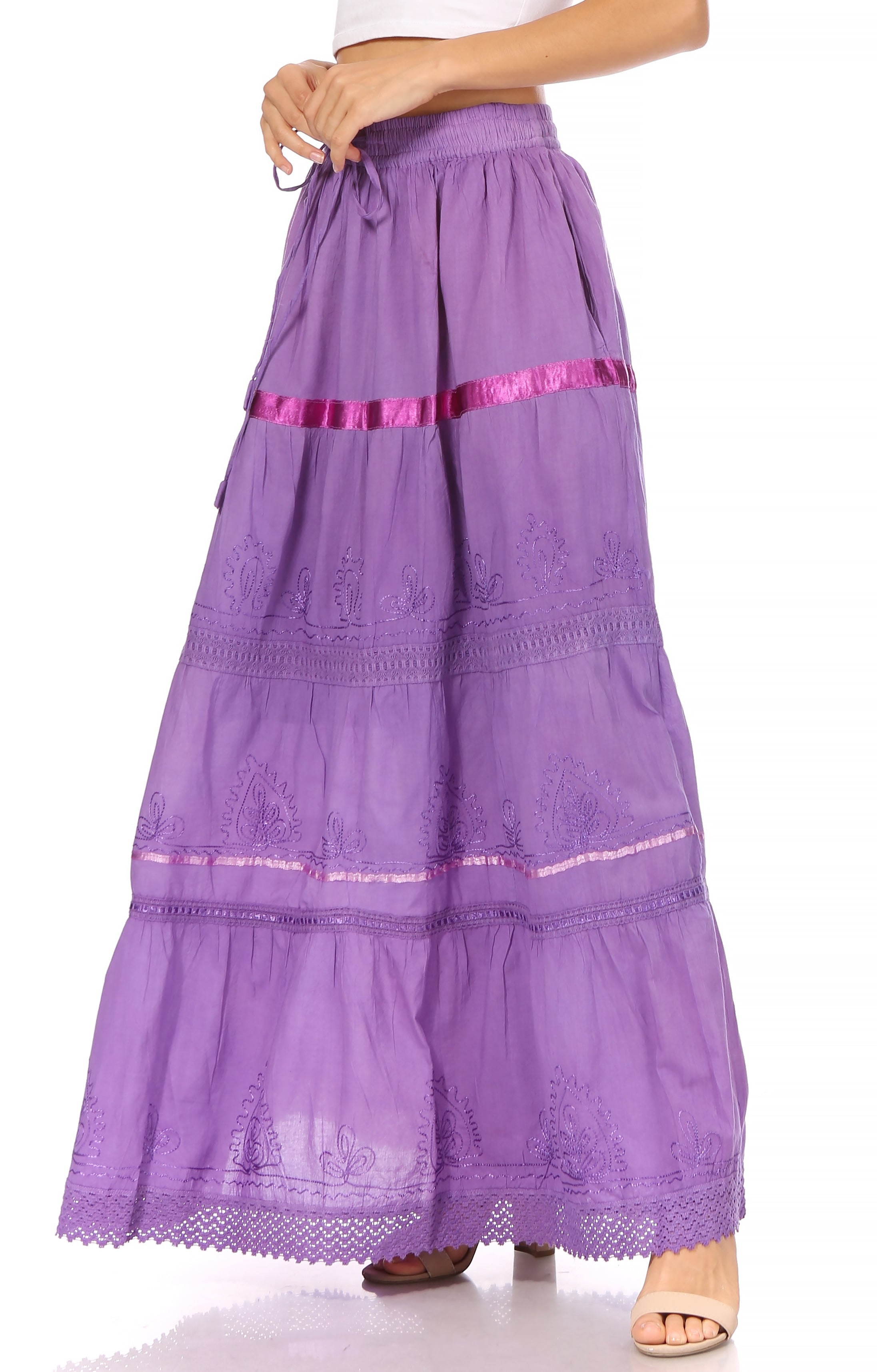 Purple tiered skirt with pink waistband on a white background