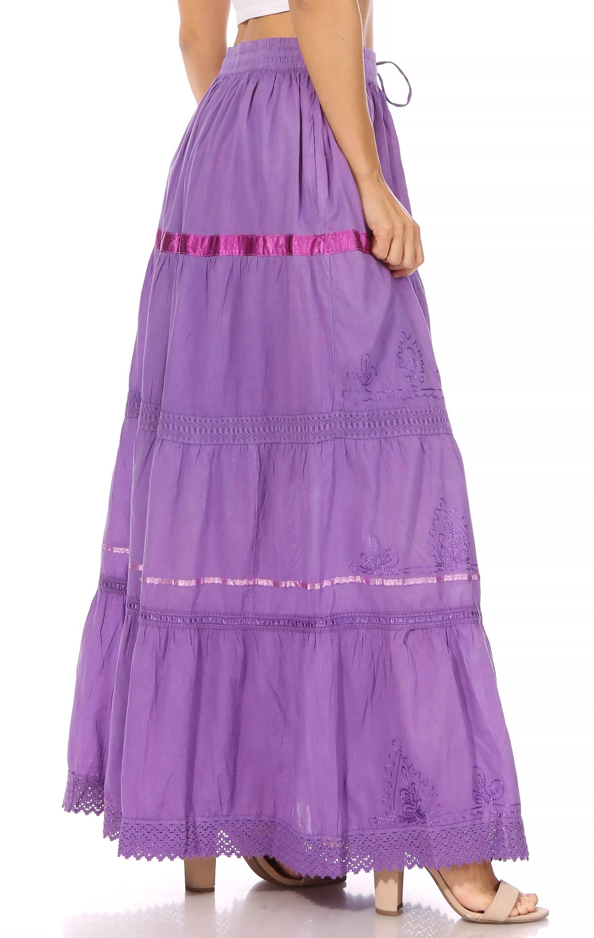 Purple tiered skirt with lace hem on a white background