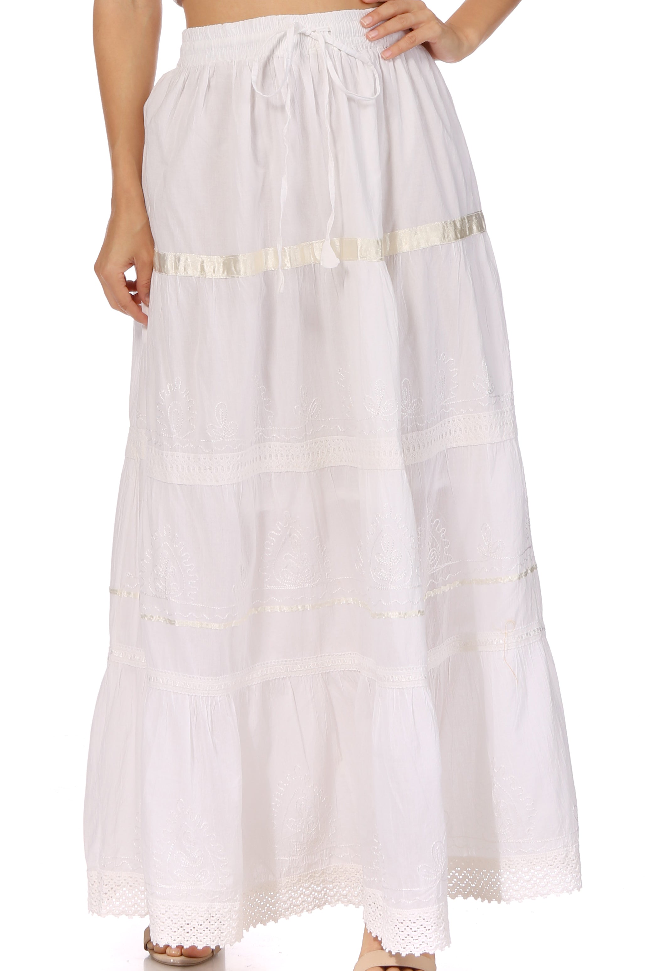 White skirt with gold trim on a white background