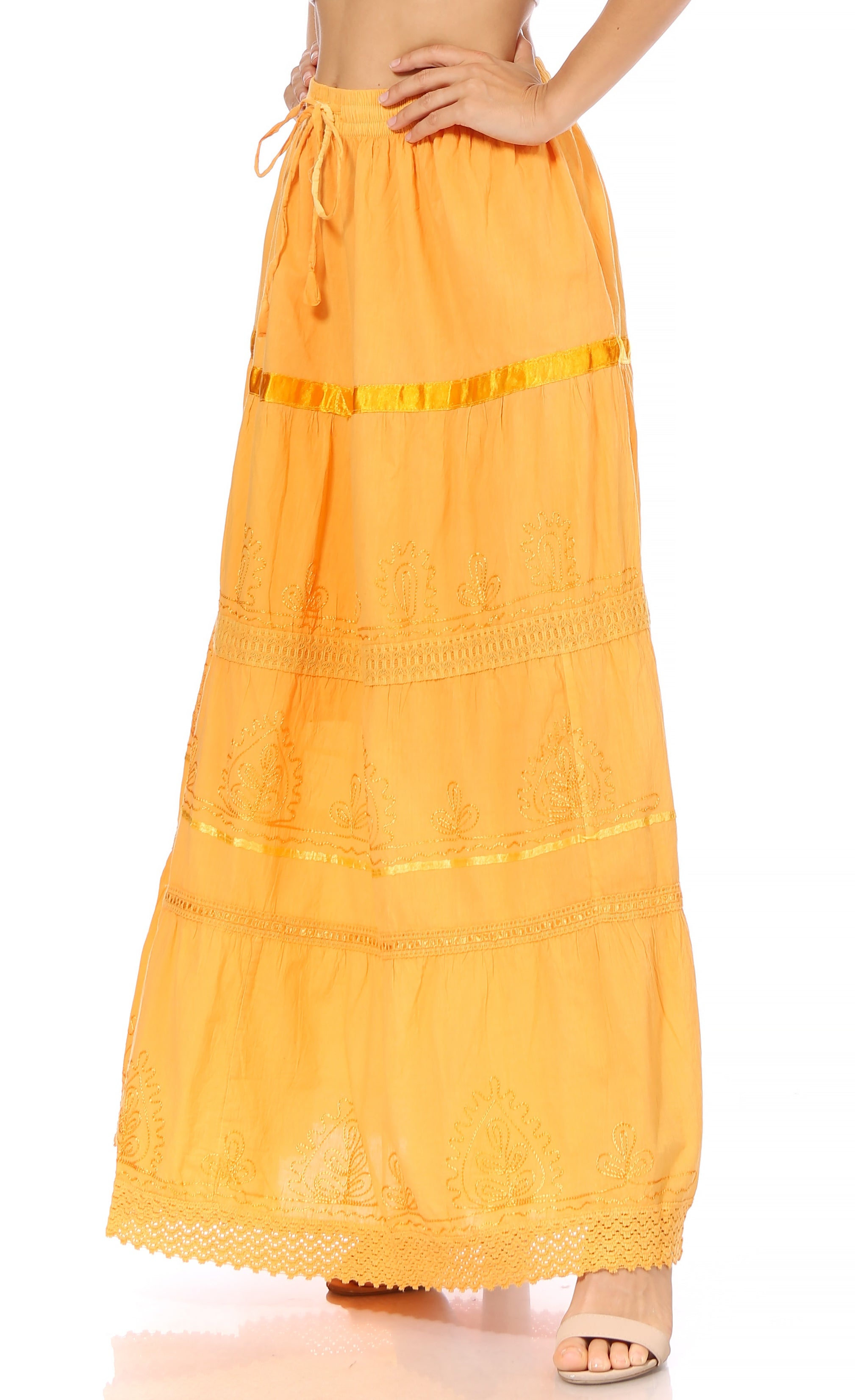 Orange long skirt with lace details on a white background