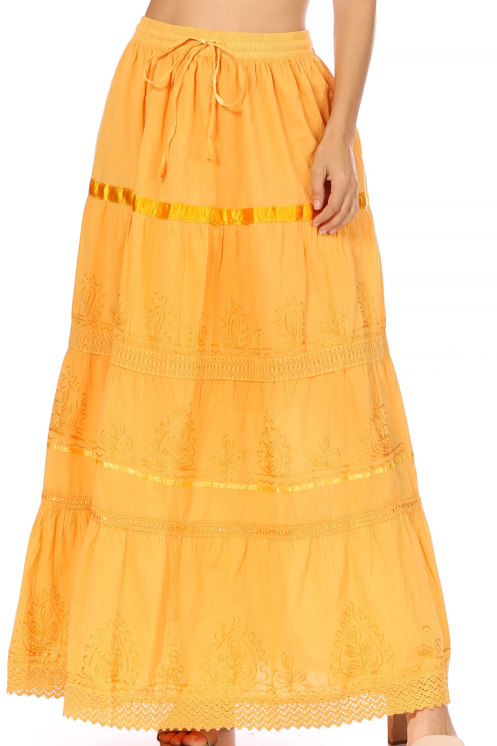 Orange tiered skirt with lace details on a white background