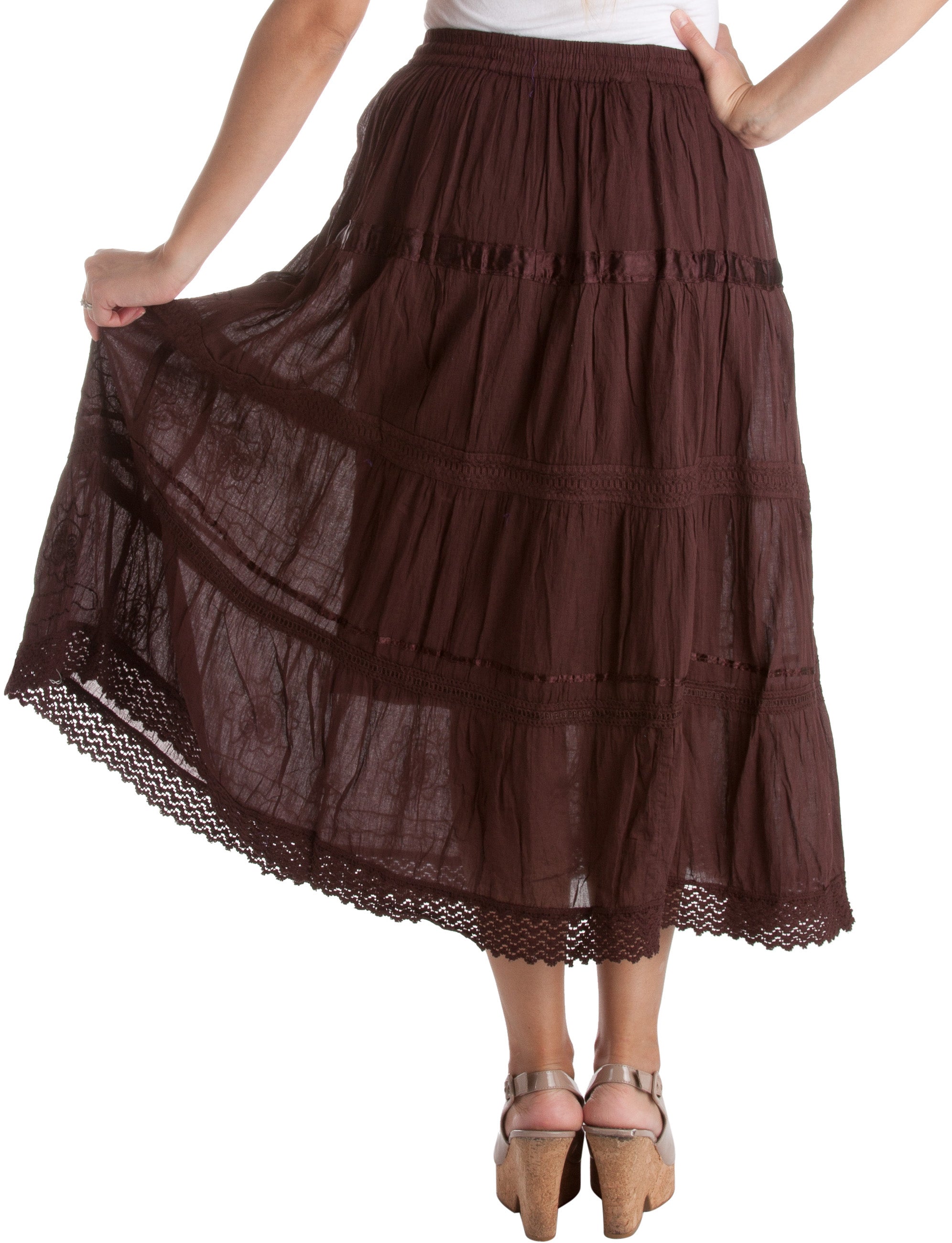 Brown tiered skirt with lace trim on a white background