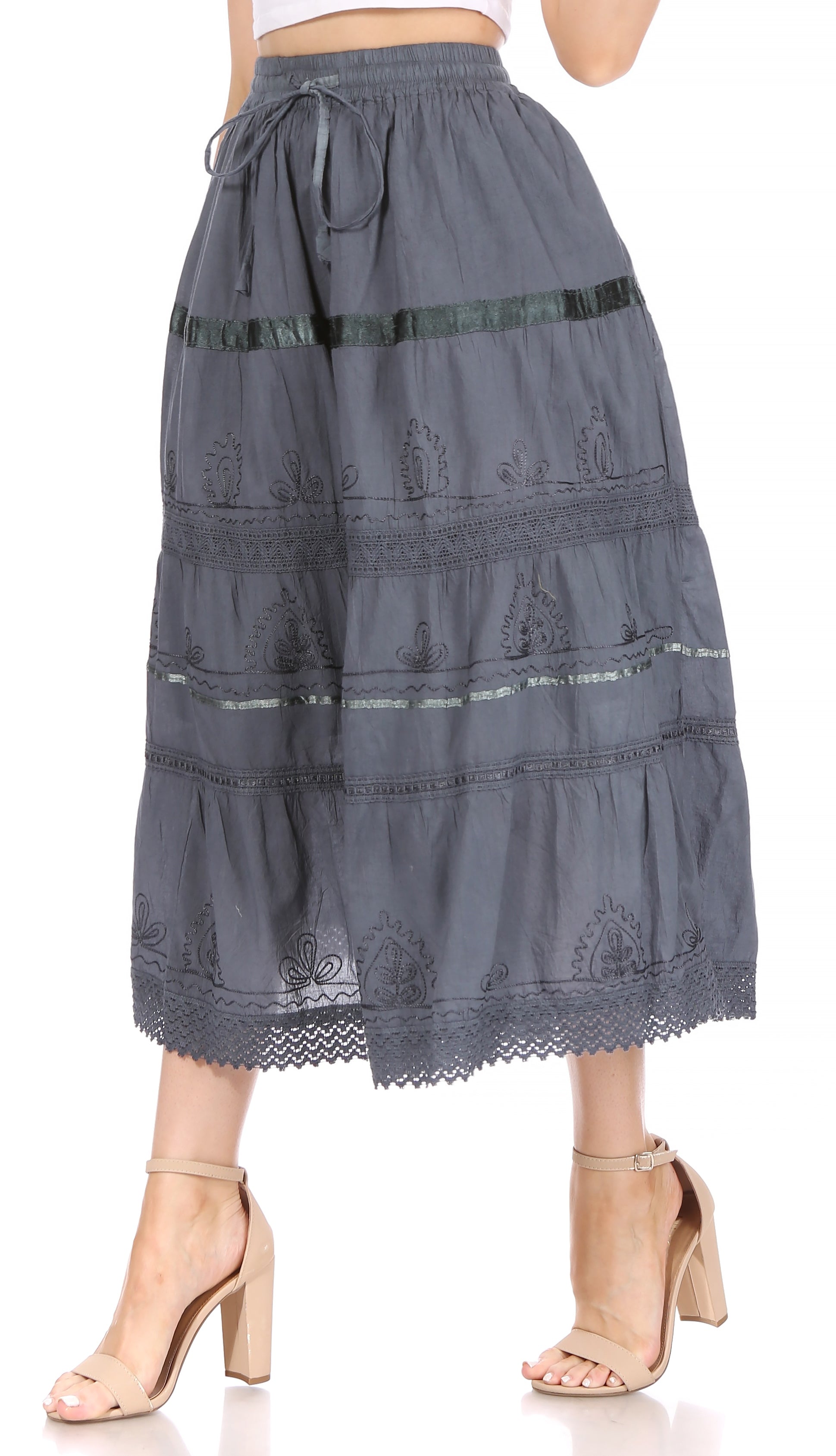 Long gray skirt with lace details on a white background