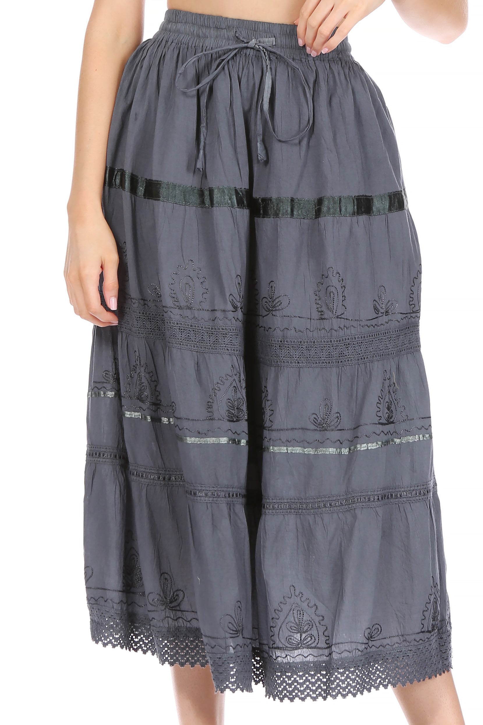 Gray embroidered skirt with black trim on a white background