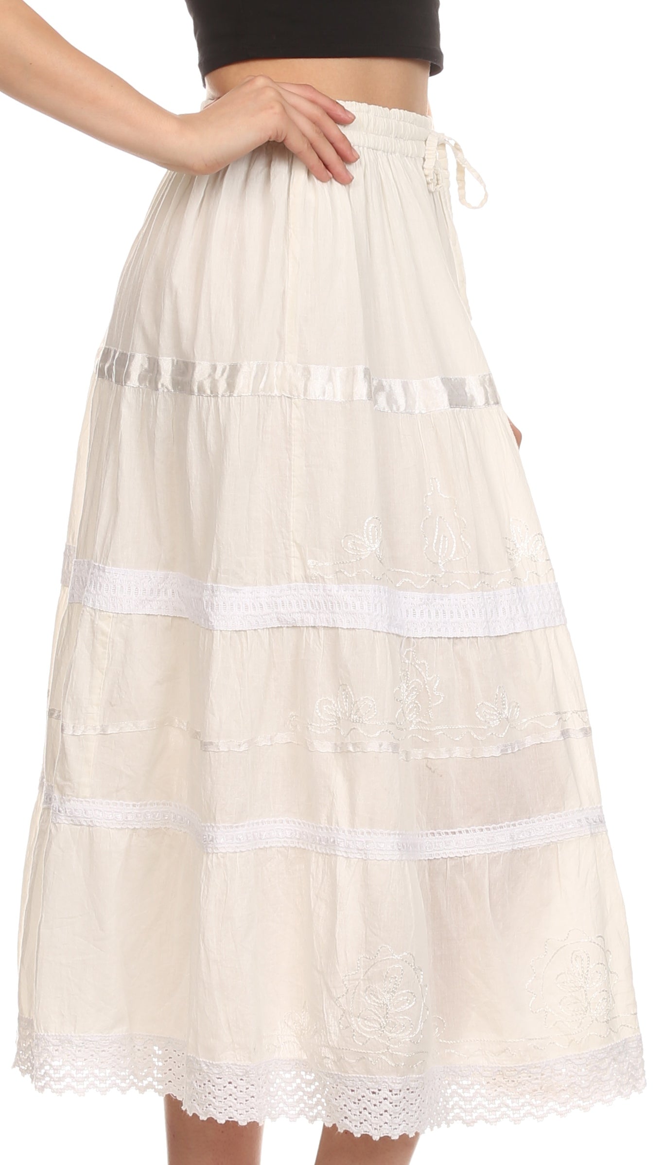 Beige lace skirt with white trim on a white background