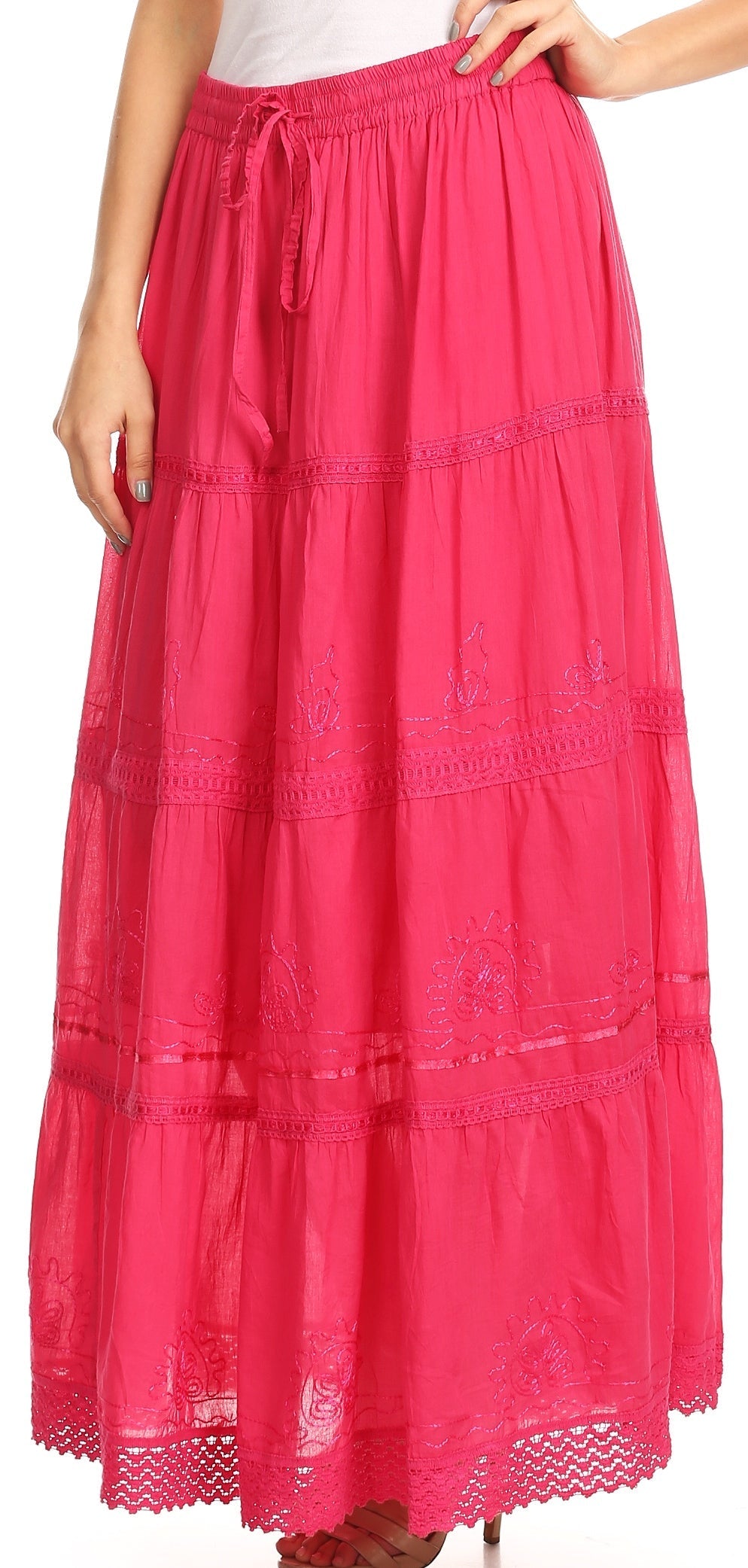 Pink long skirt with lace details on a white background