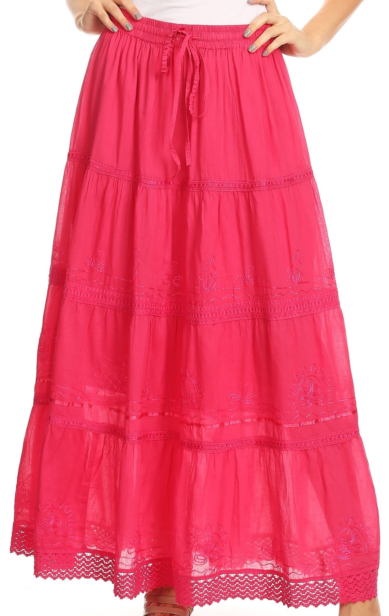 Pink tiered skirt with lace hem on a white background