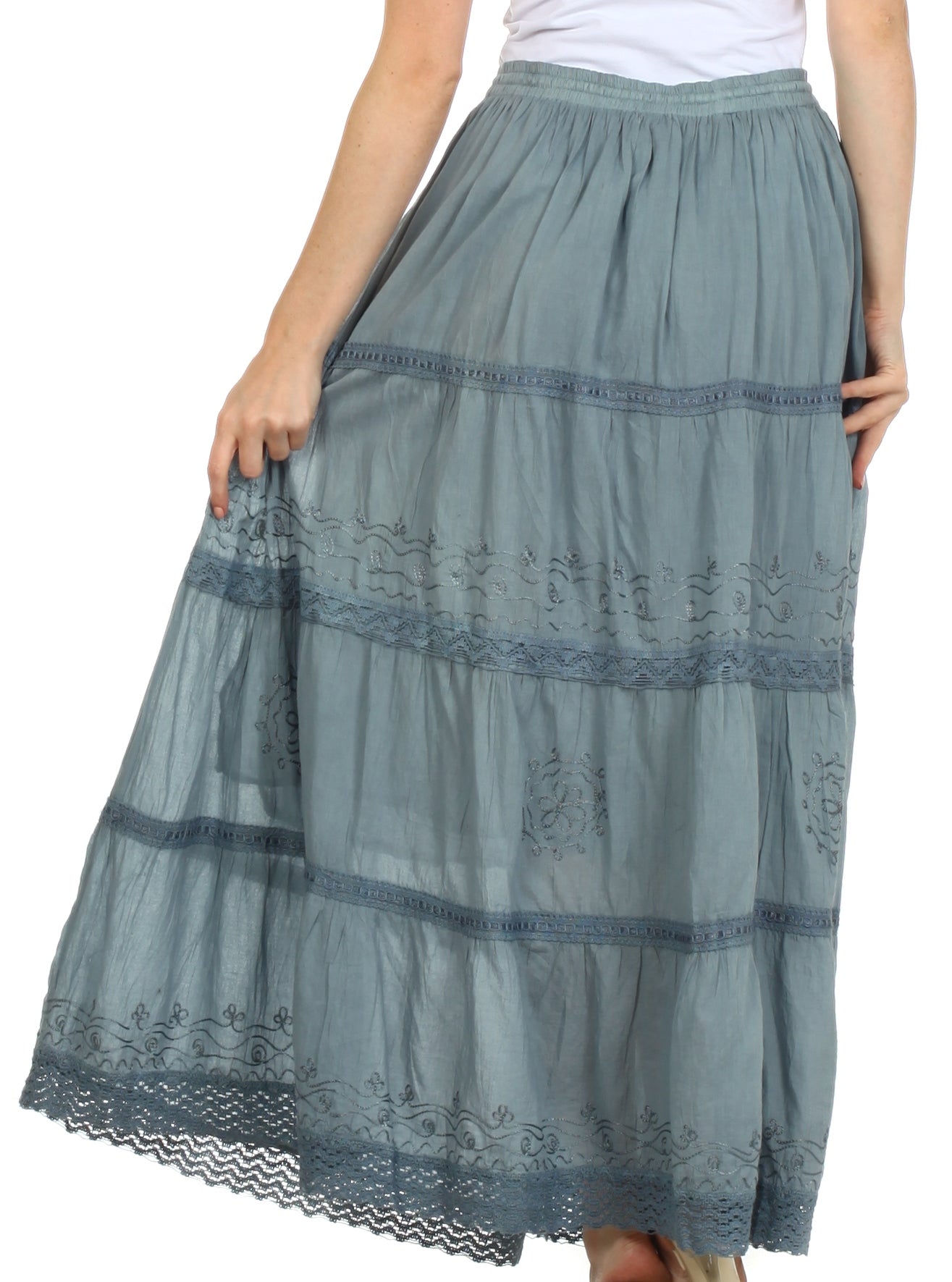 Long, tiered skirt with lace details on a white background