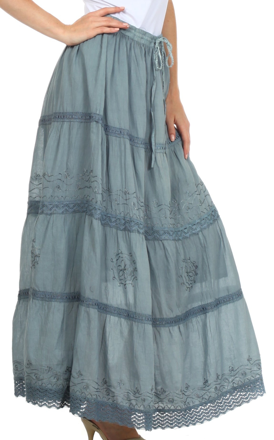 Long light blue skirt with lace details on a white background