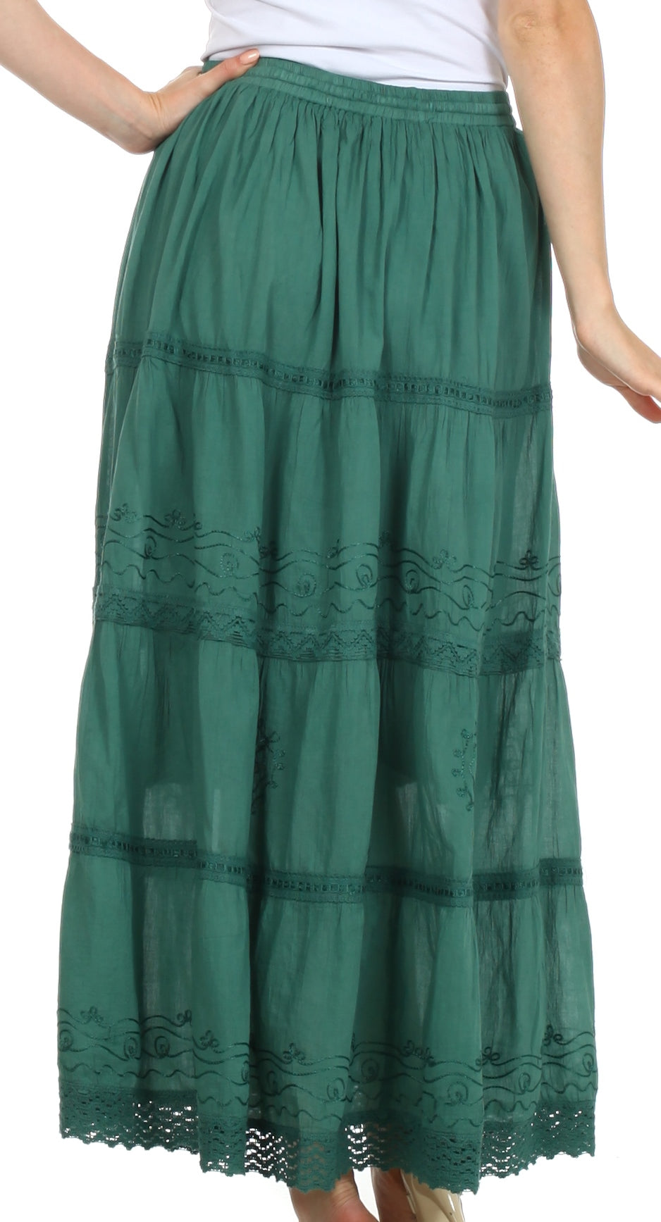 Green tiered skirt with lace details on a white background