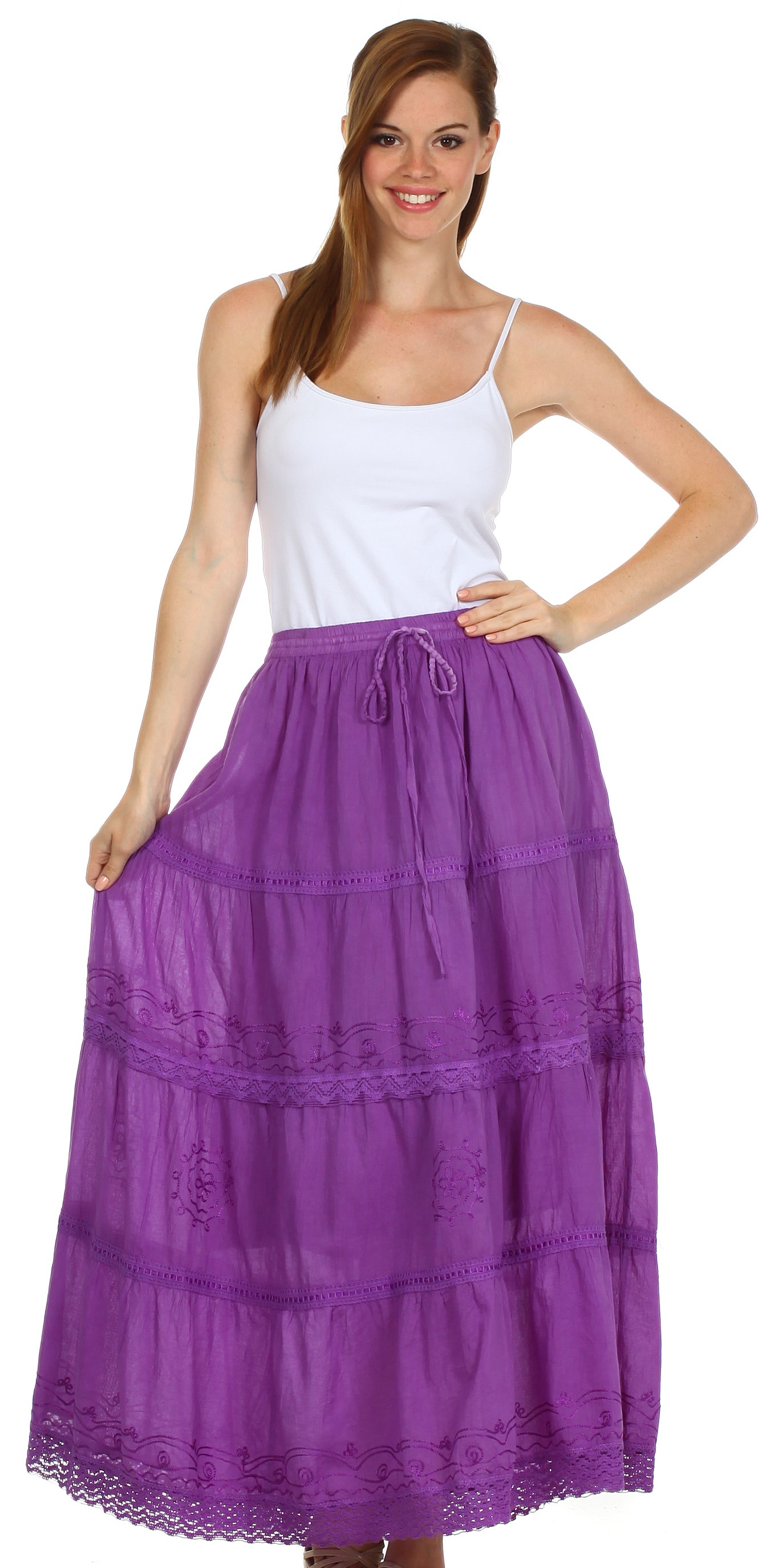 Woman wearing a white top and purple skirt on a white background