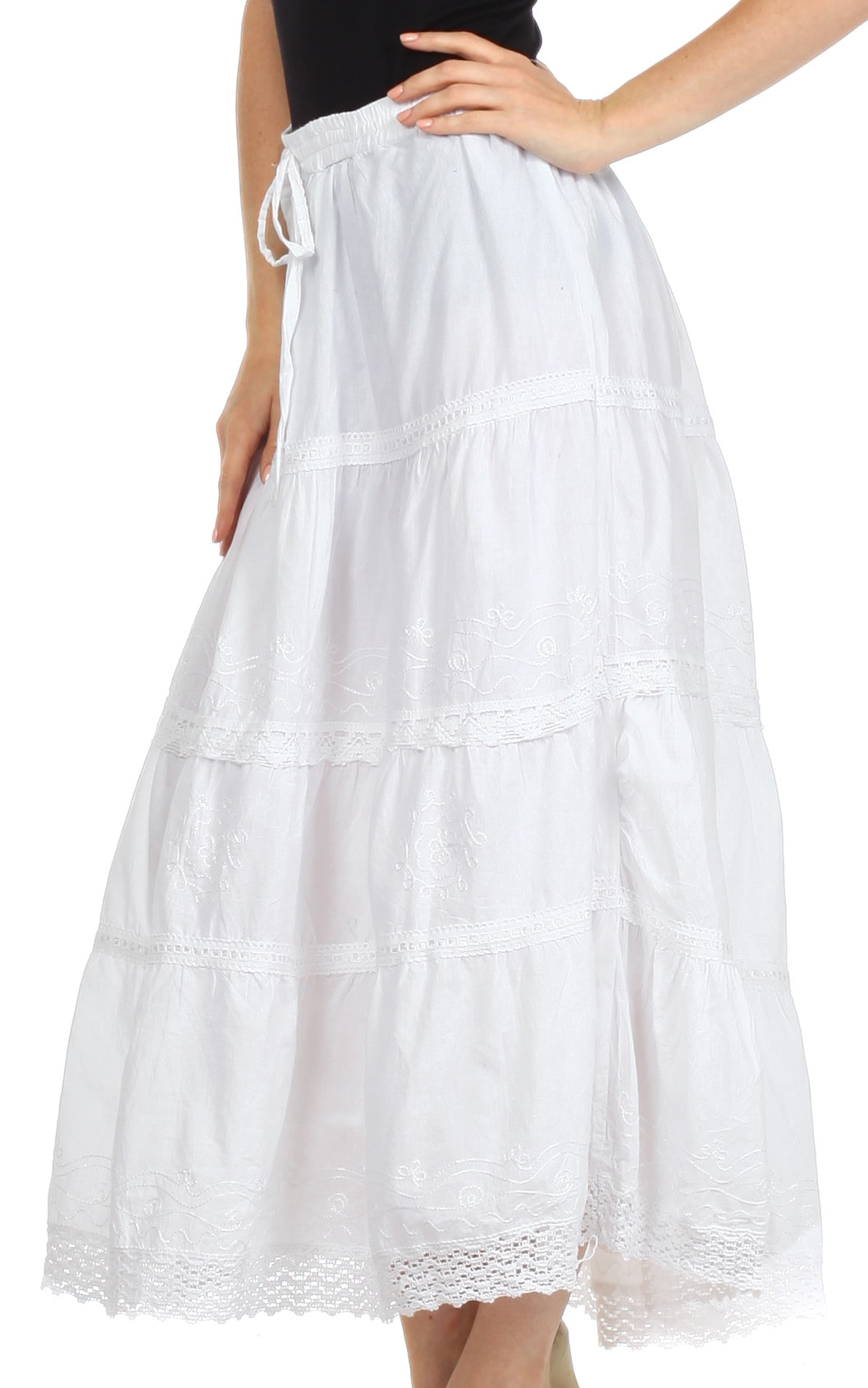 White lace skirt worn by a person on a white background