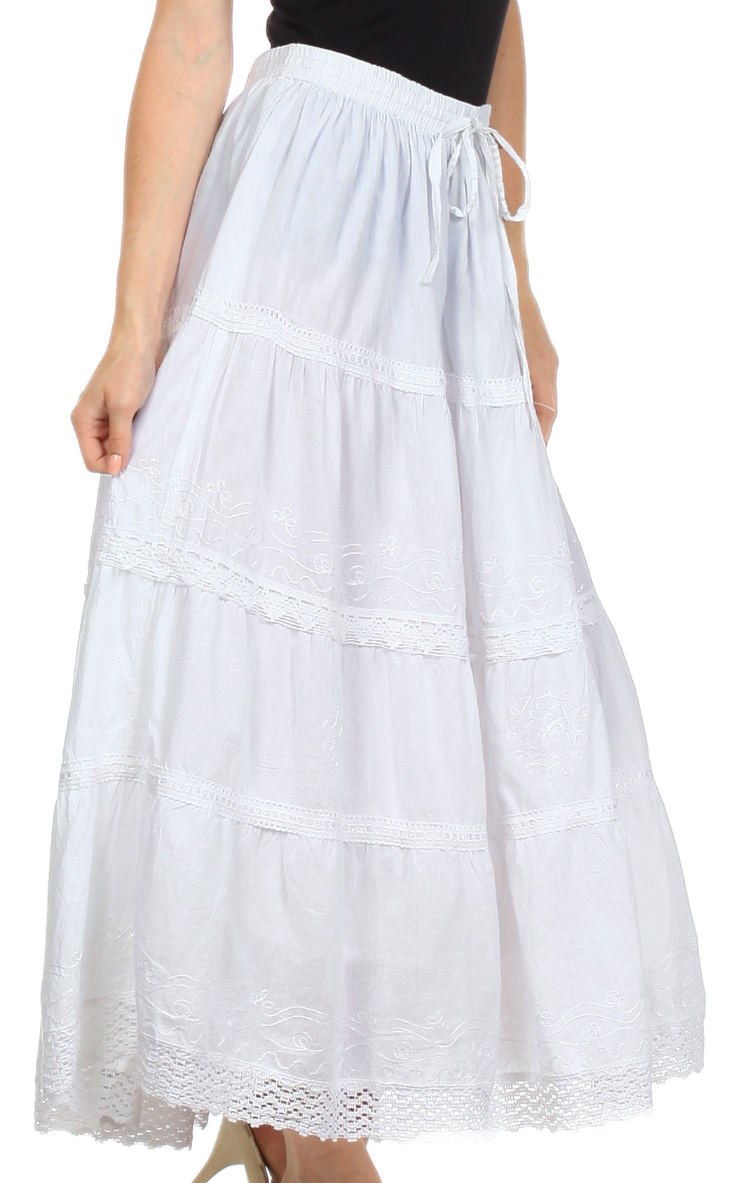 White tiered skirt worn by a person on a white background