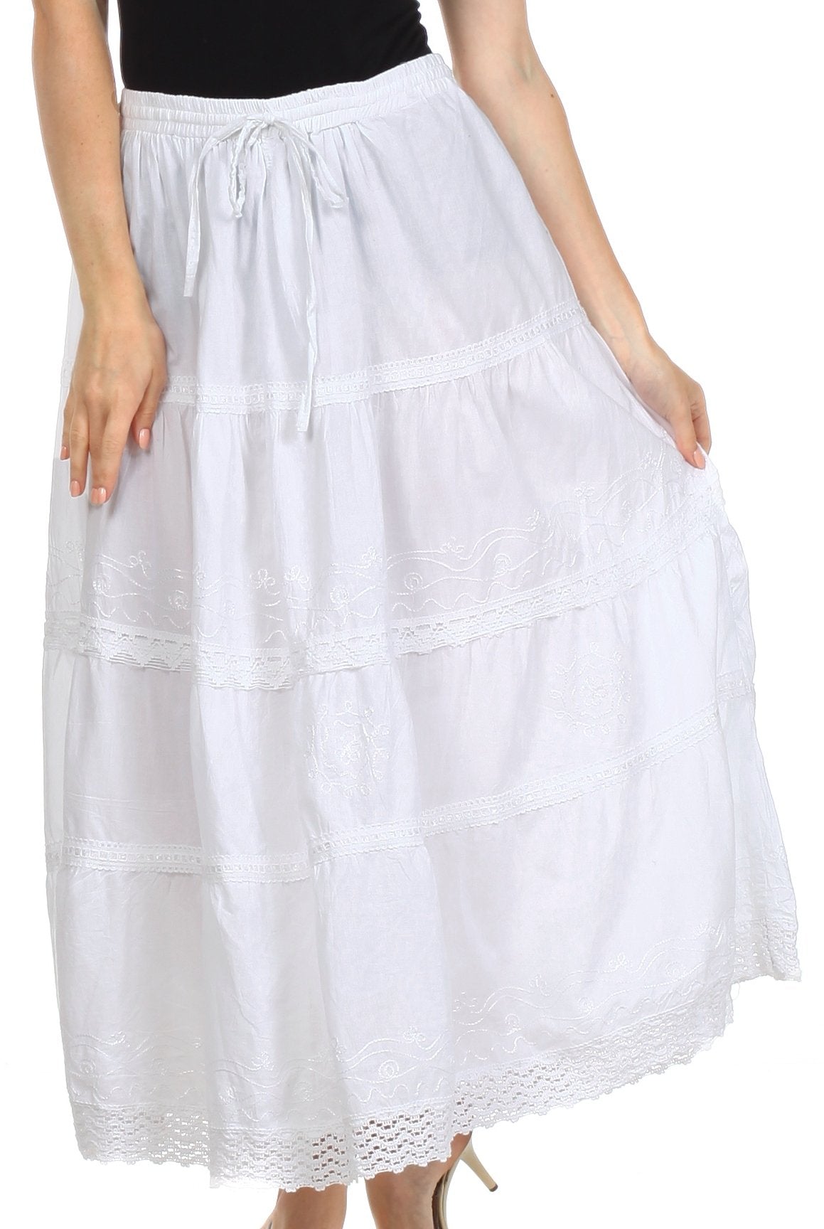 White lace-trimmed skirt worn by a person on a white background