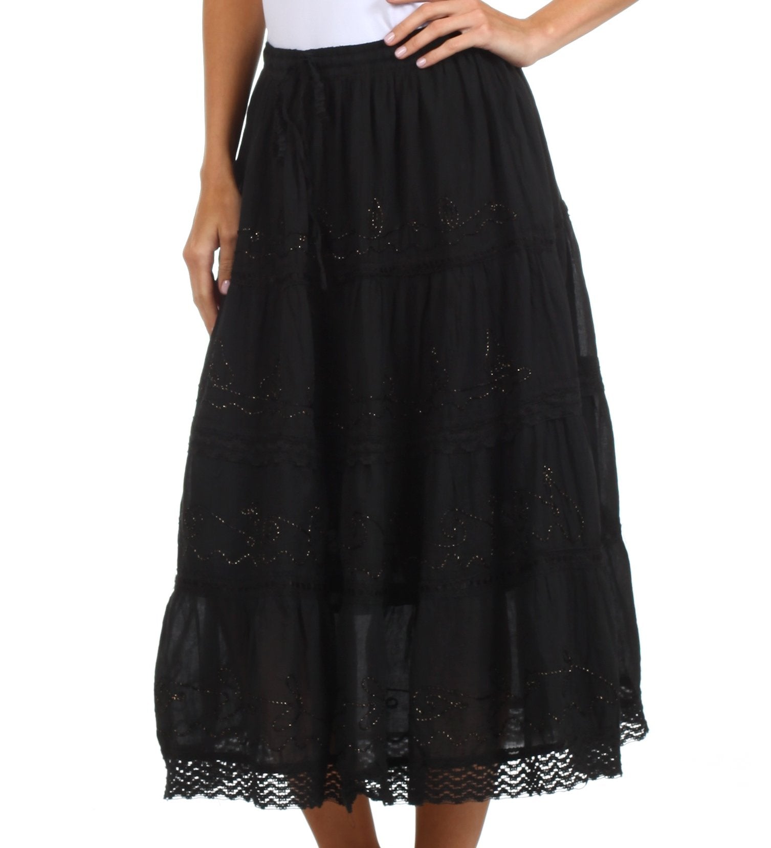Black lace skirt worn by a person on a white background