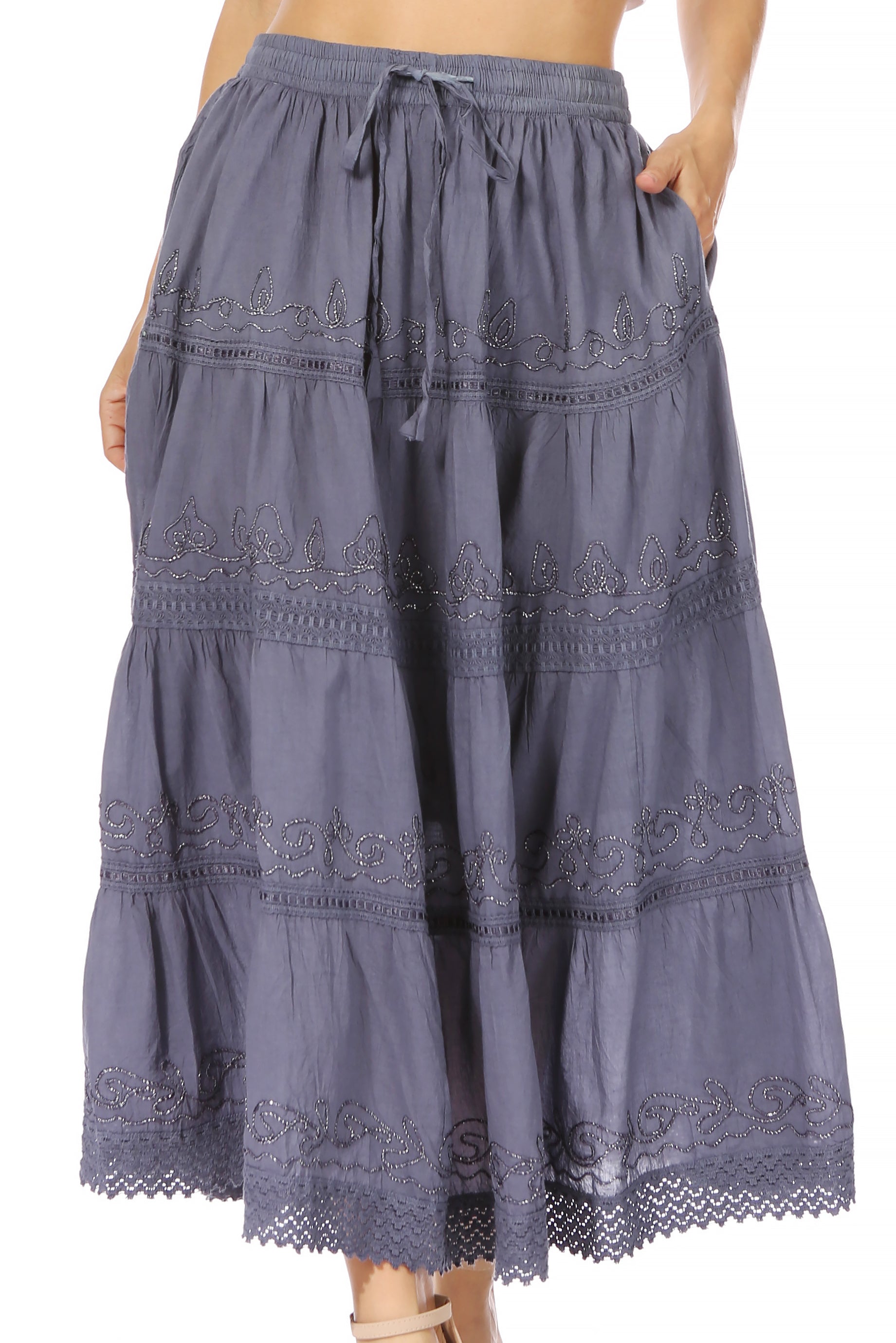 Long, tiered skirt with lace details on a white background
