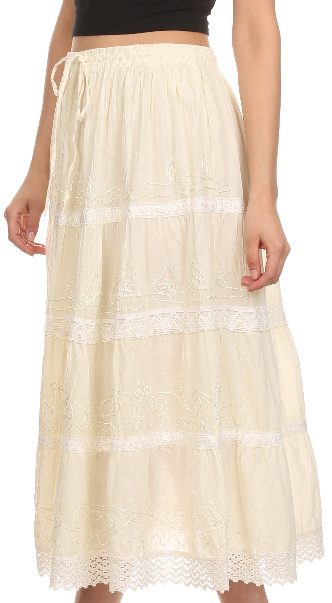 Beige lace-trimmed skirt worn by a person on a white background
