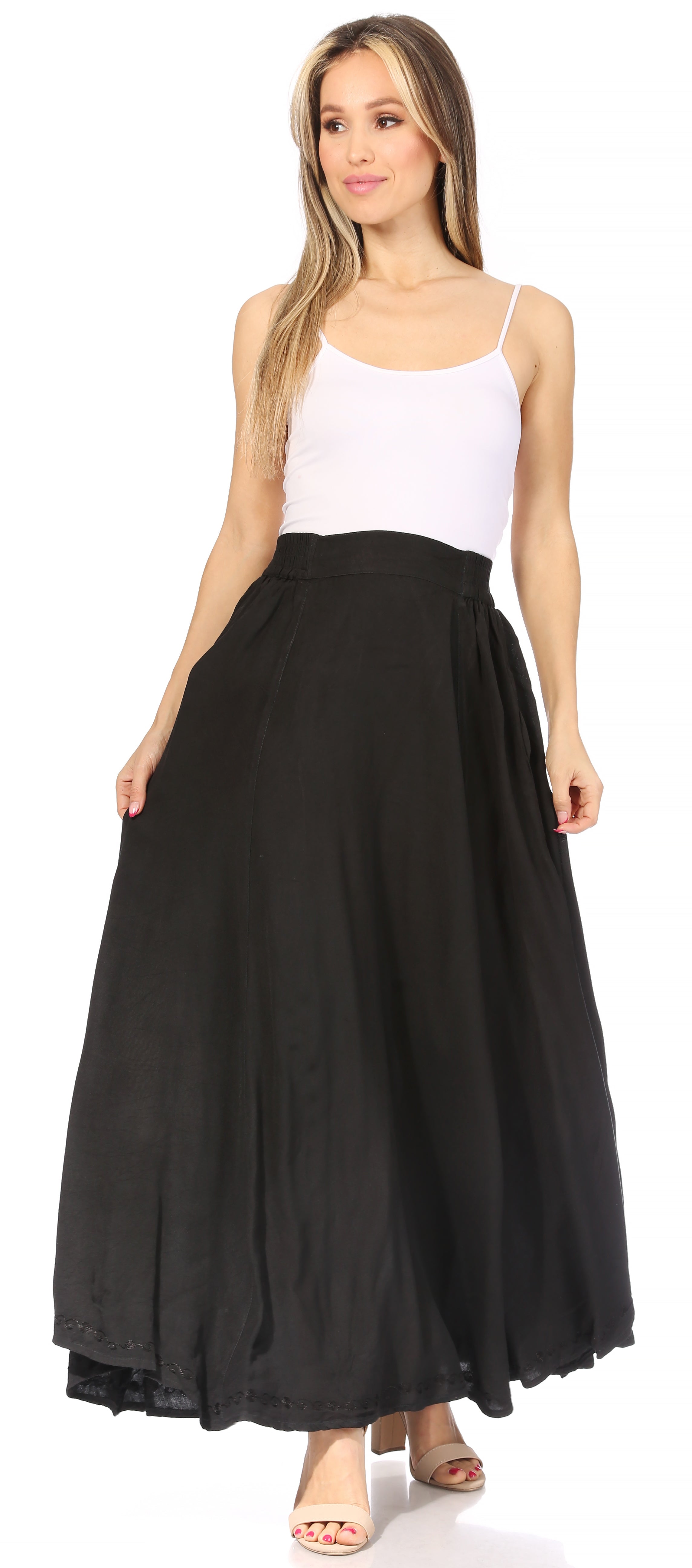 Woman wearing a black skirt and white top on a white background