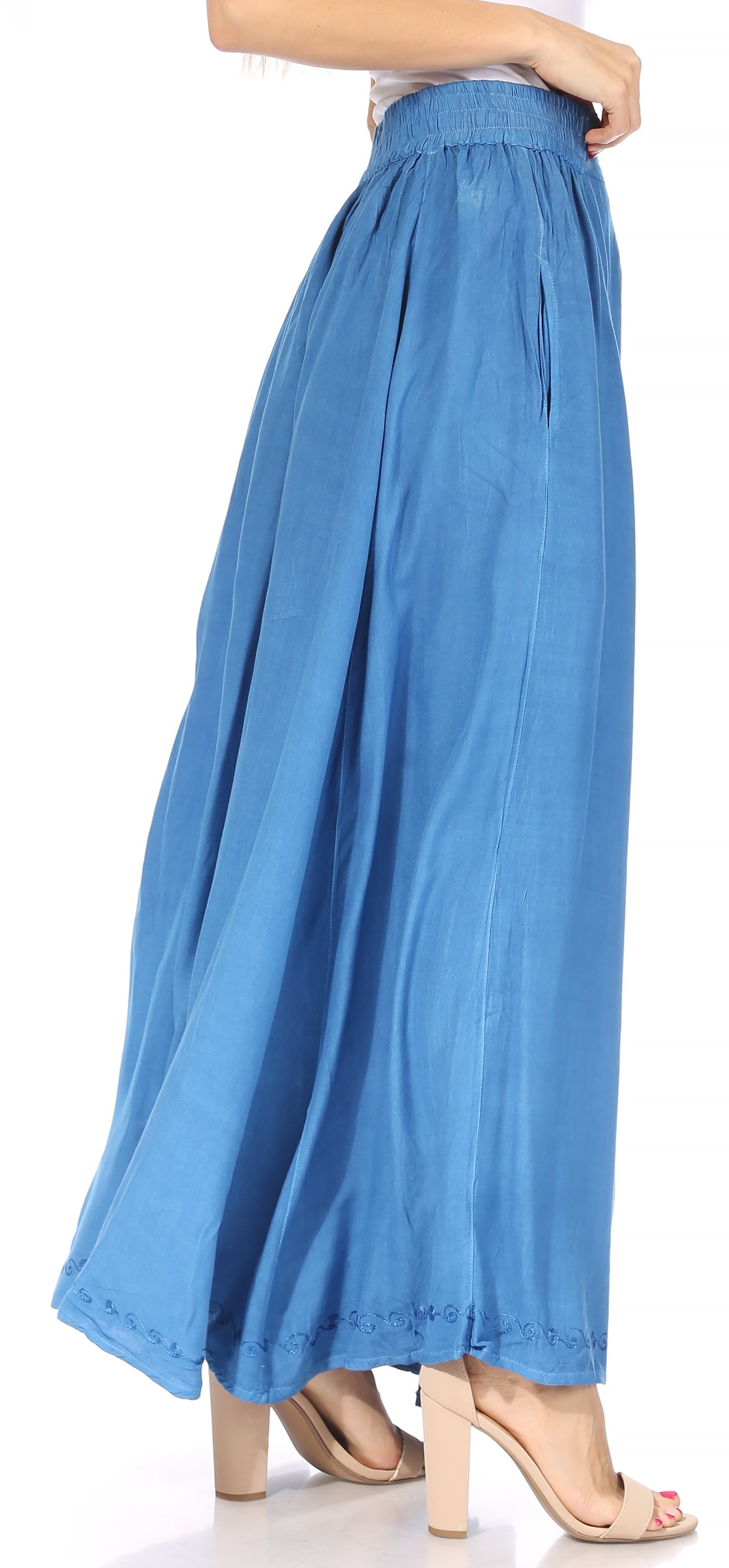 Blue wide-leg pants worn by a person on a white background