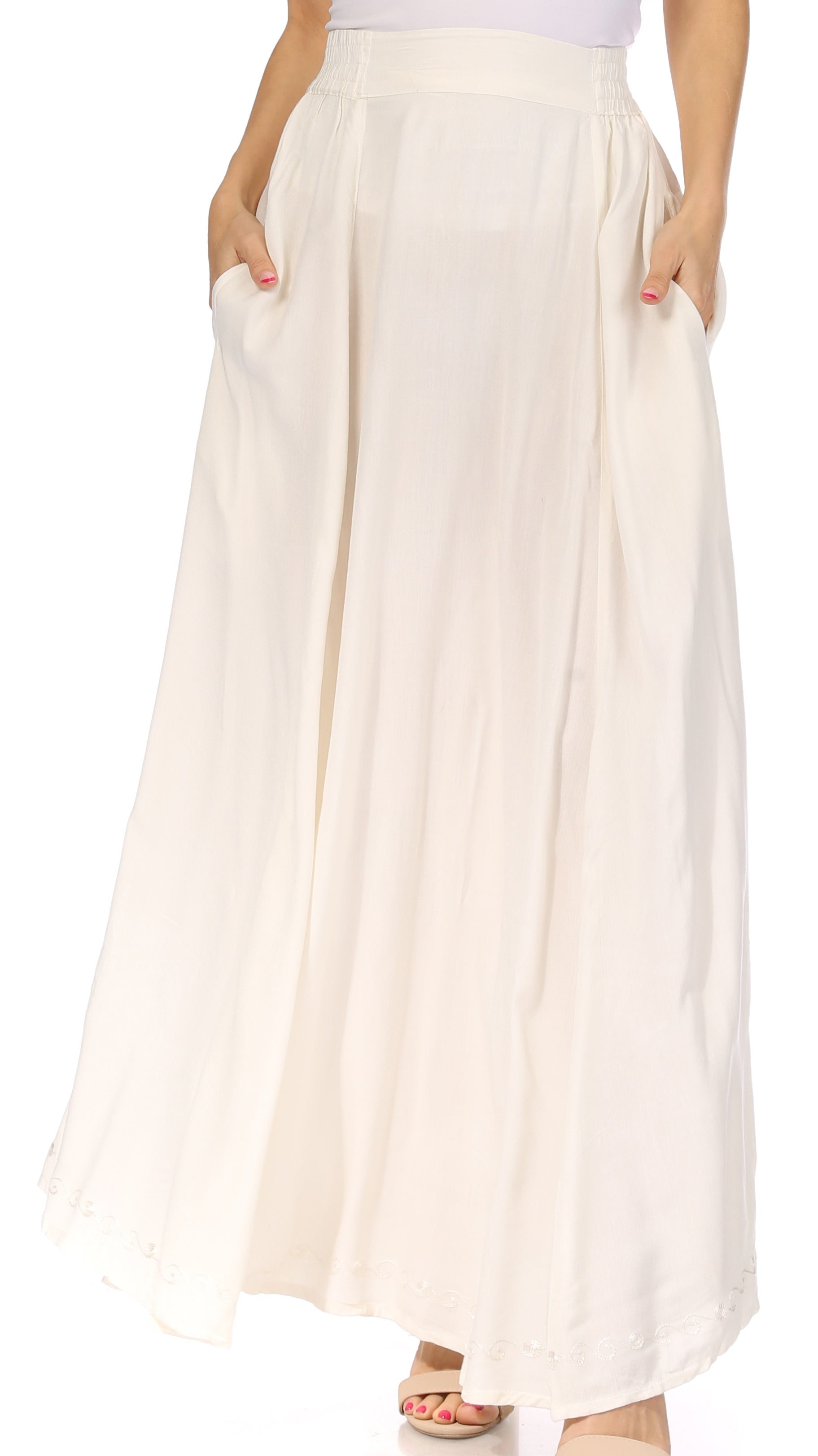 White wide-leg pants worn by a person on a white background