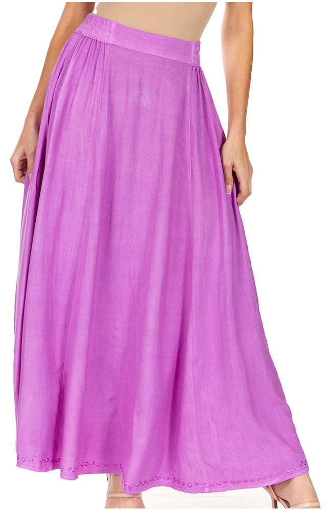 Purple skirt worn by a person on a white background
