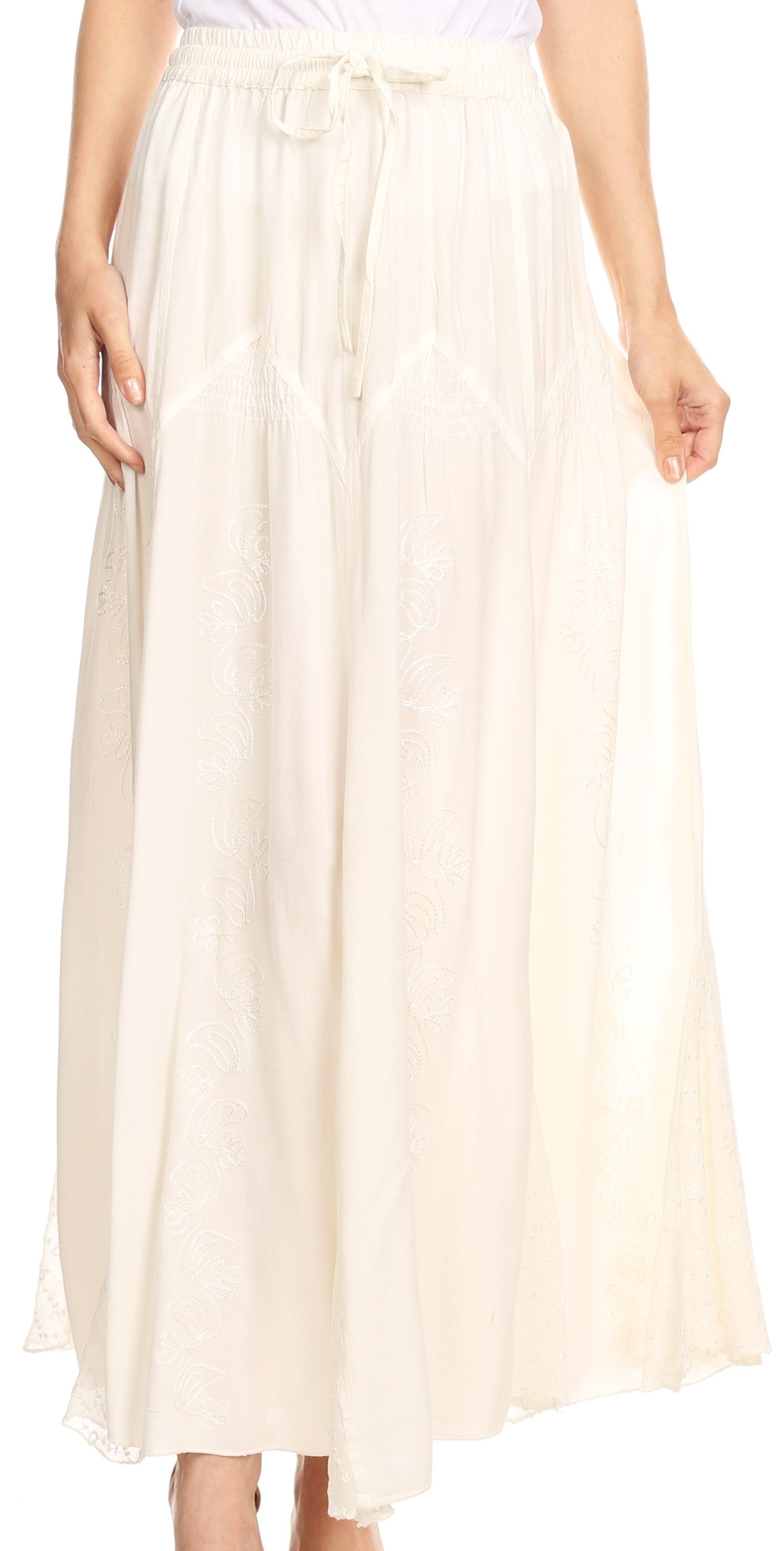 Woman wearing a long, light-colored skirt on a white background