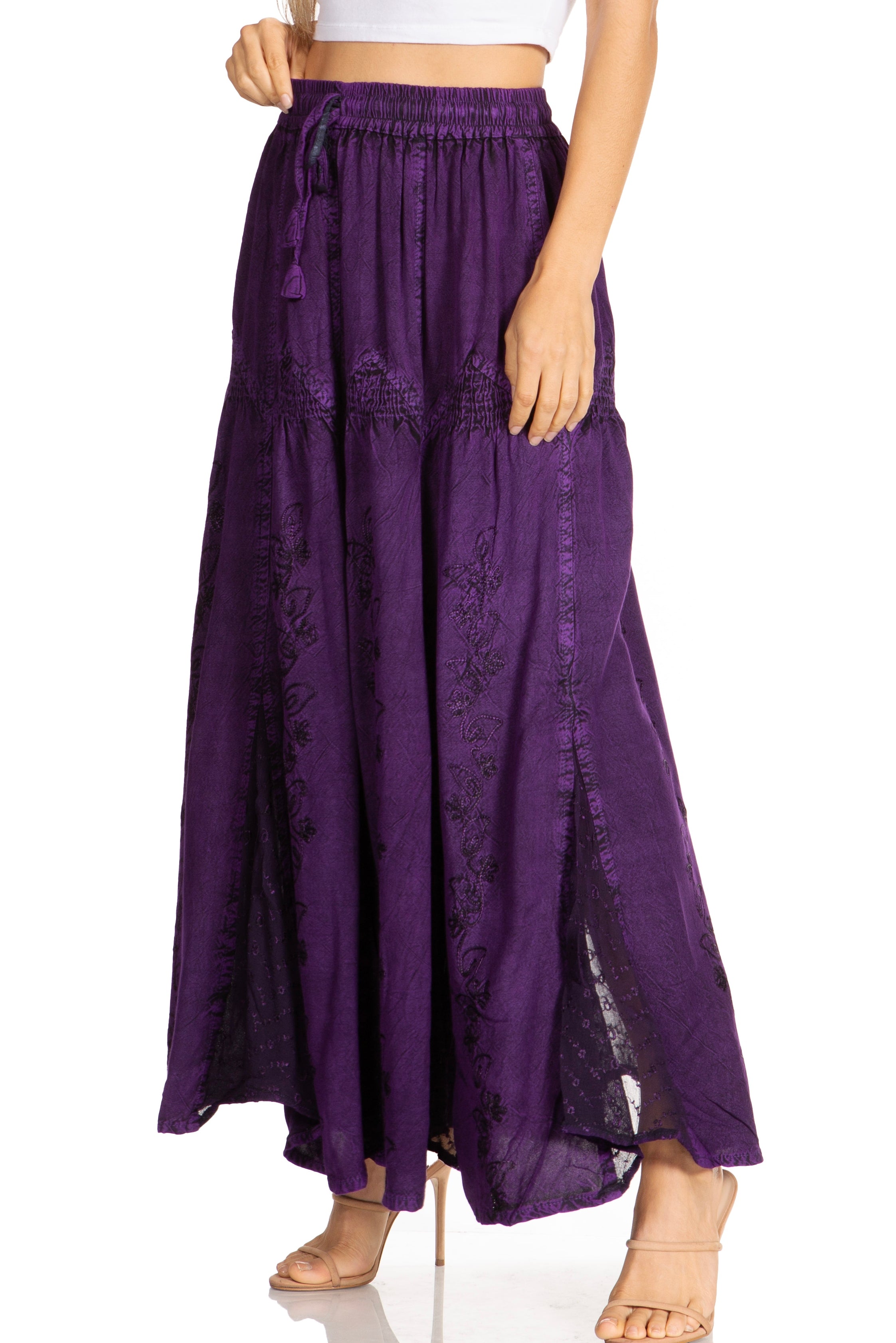 Purple maxi skirt worn by a person on a white background