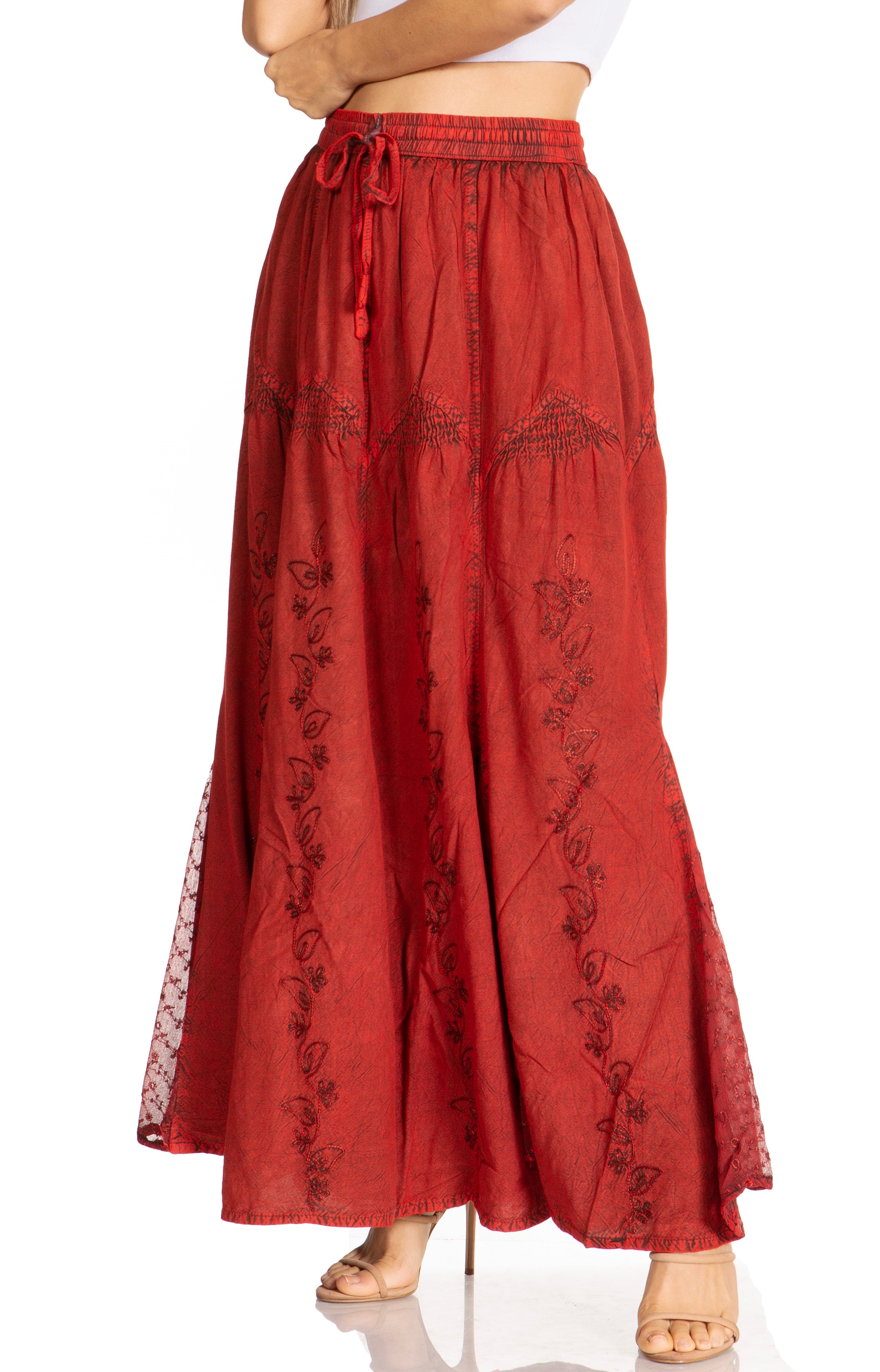 Red embroidered pants on a white background