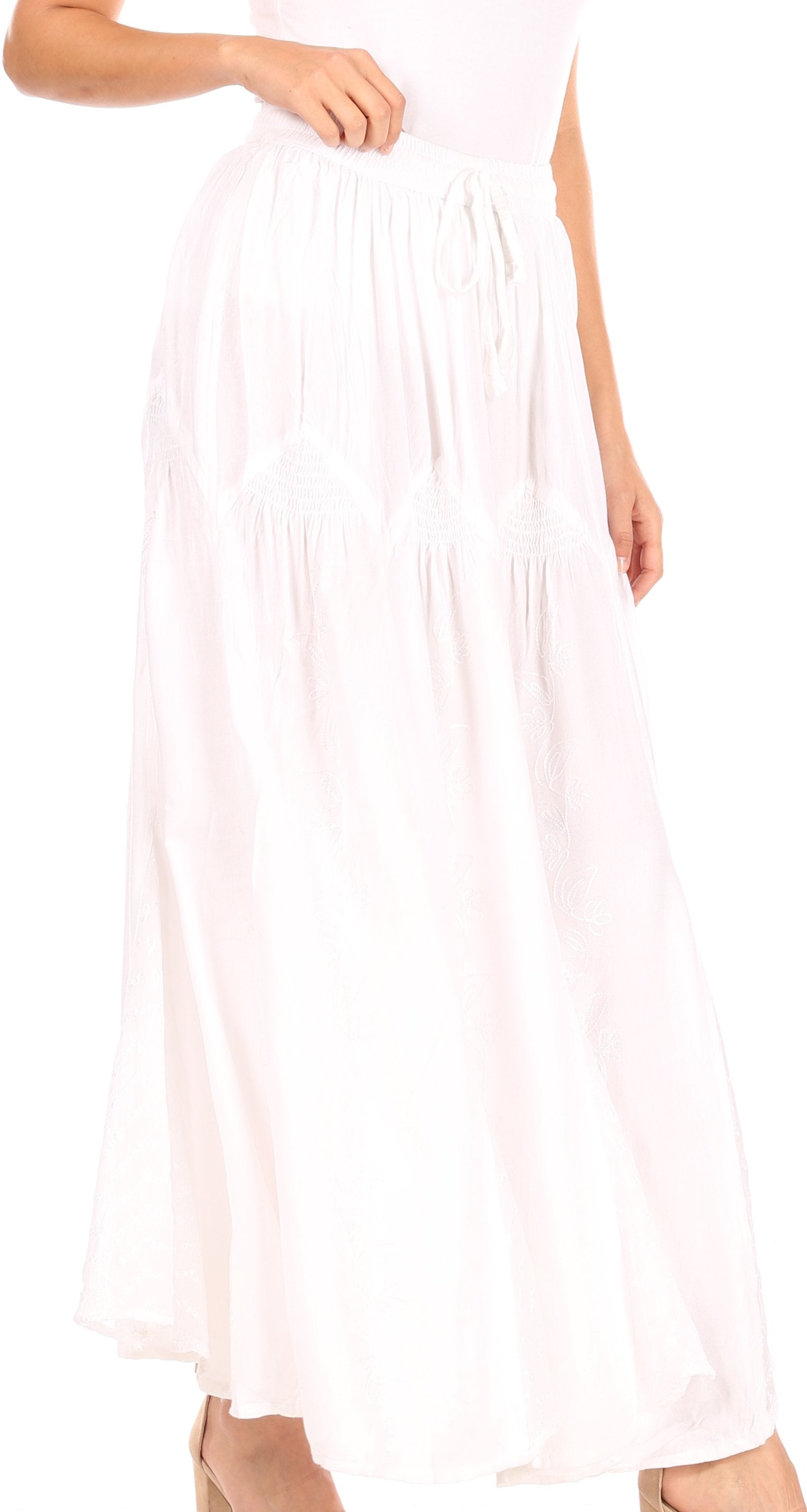 White dress with pleated skirt on a white background