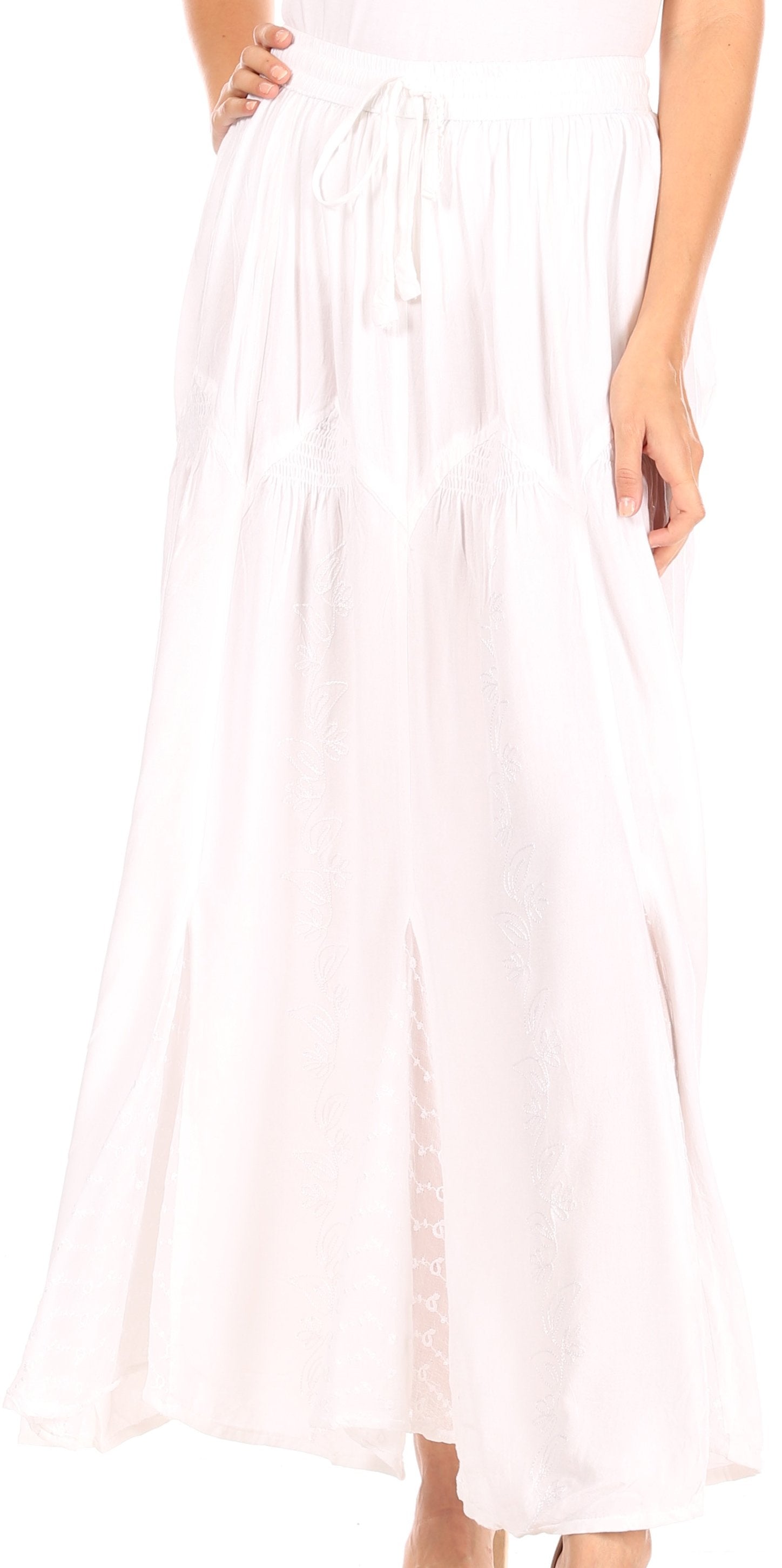 White pleated skirt worn by a person on a white background