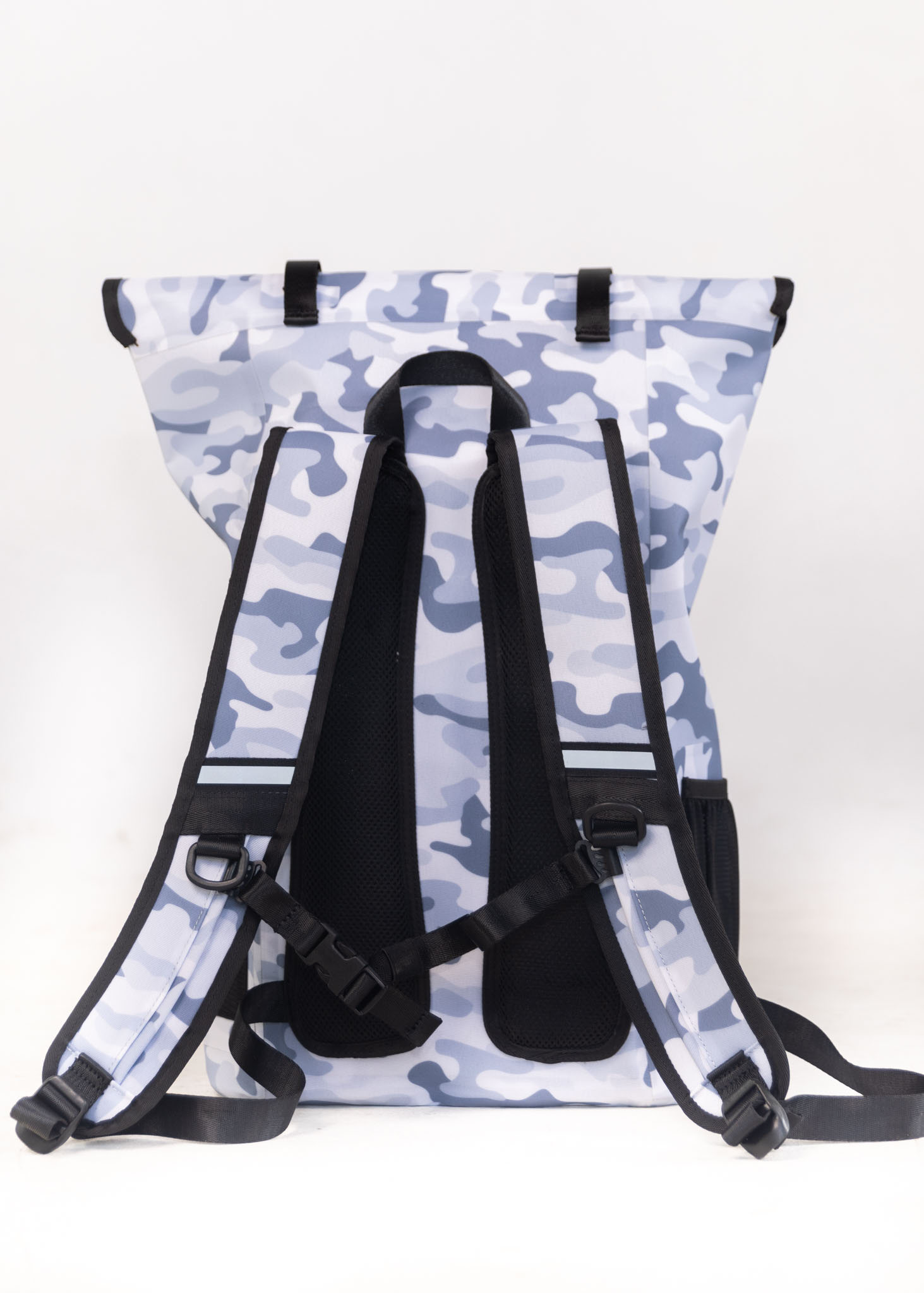 Backpack with blue camouflage pattern on a white background