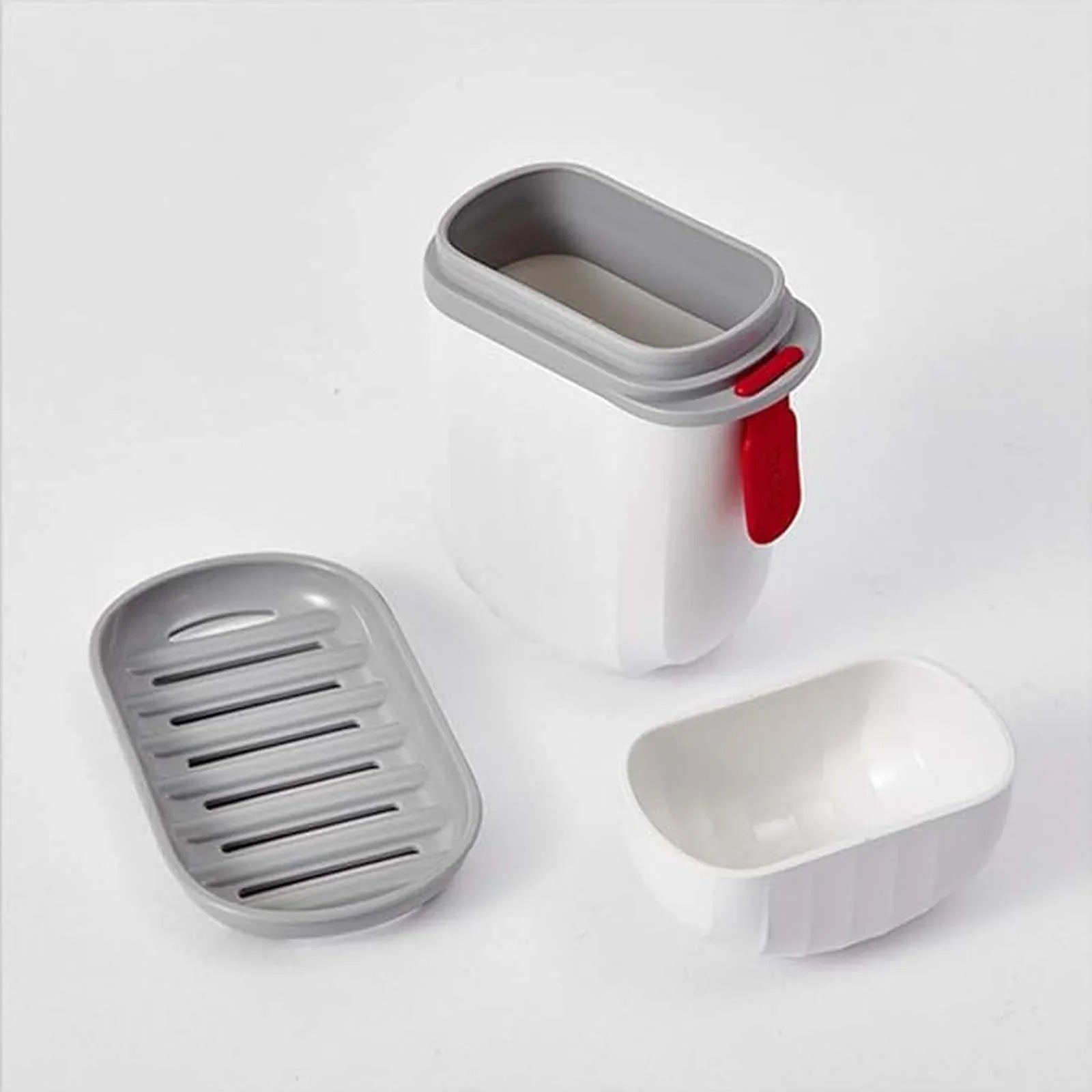 Set of three kitchen containers with different shapes and colors on a white background
