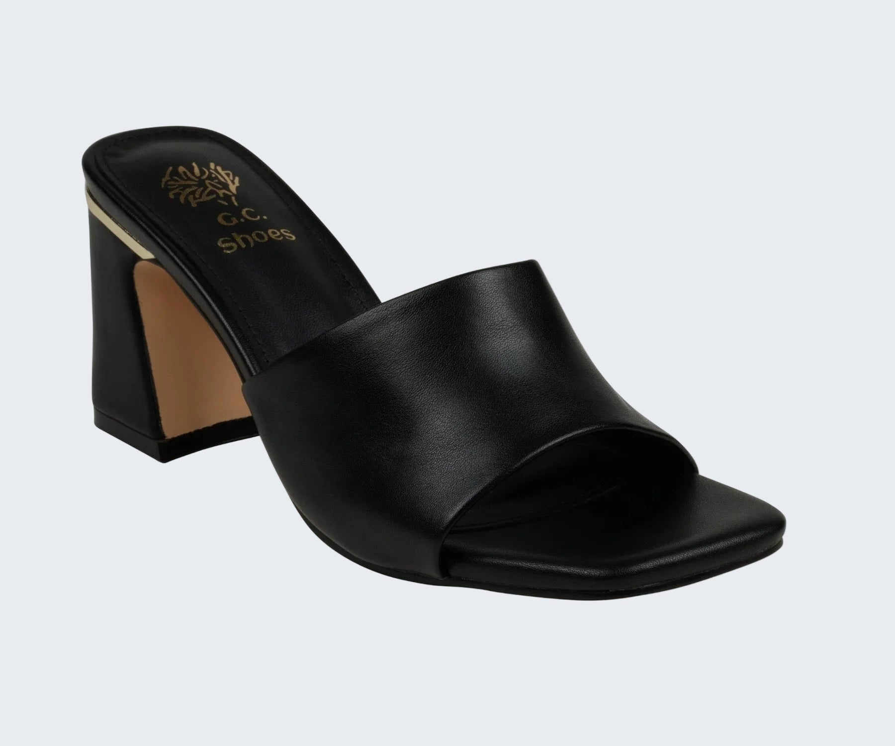 Black open-toe sandal with a block heel on a white background