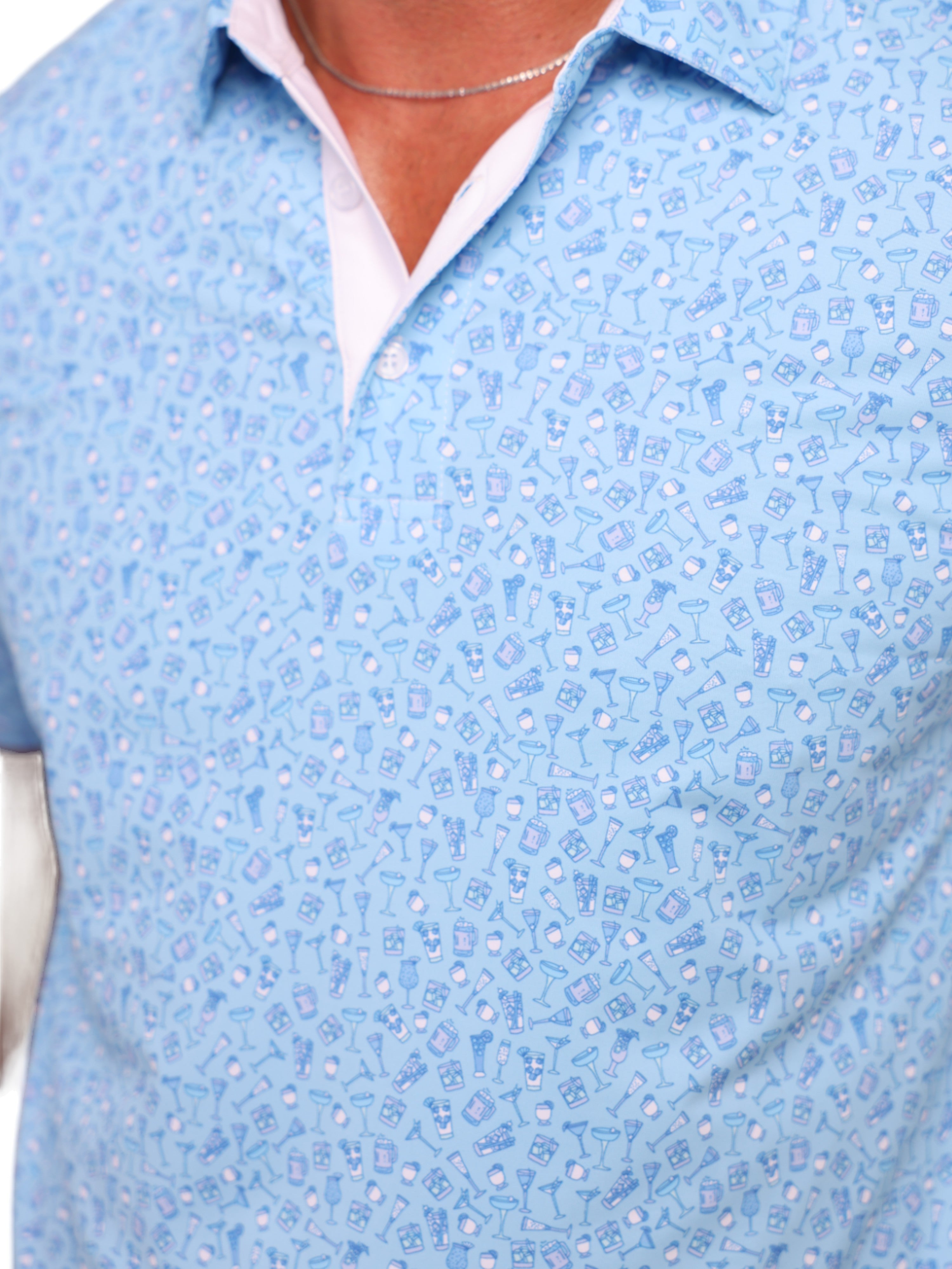 Close-up of a blue patterned shirt with a white collar