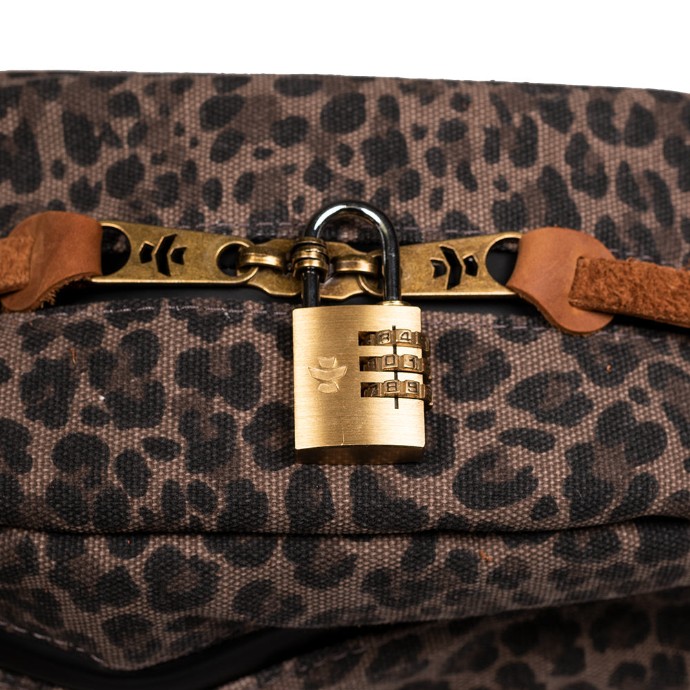 Leopard print bag with a brass padlock on a white background