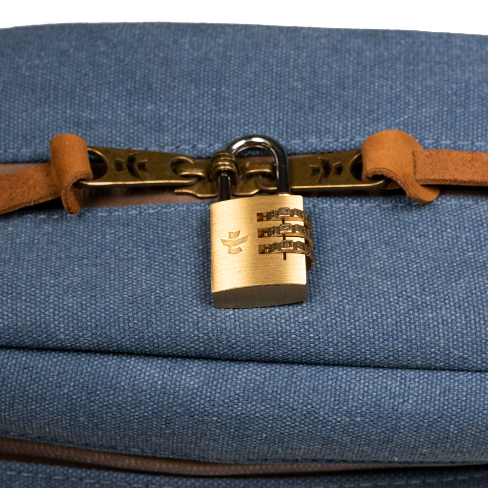 Blue bag with a gold lock on a white background