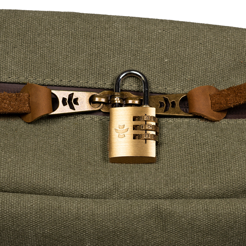 Green bag with a brass padlock on a white background