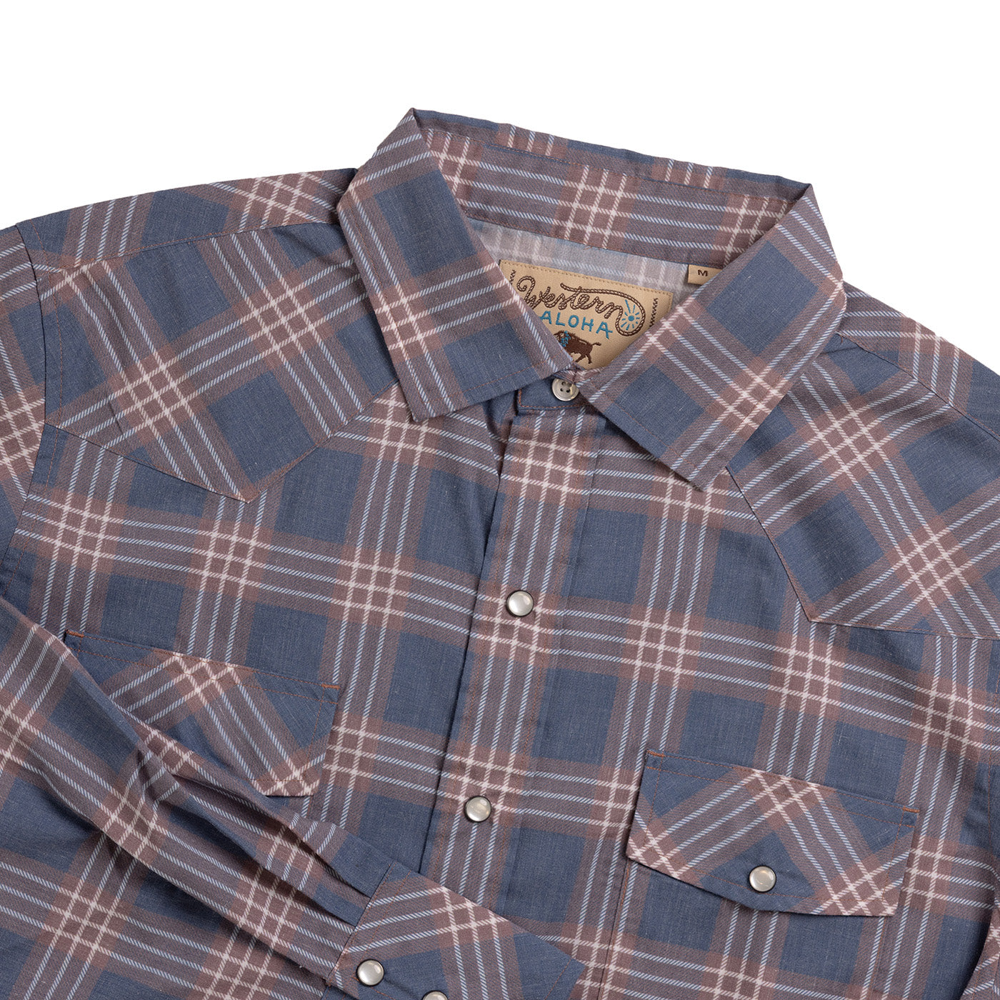 Plaid shirt with a visible brand label on a white background