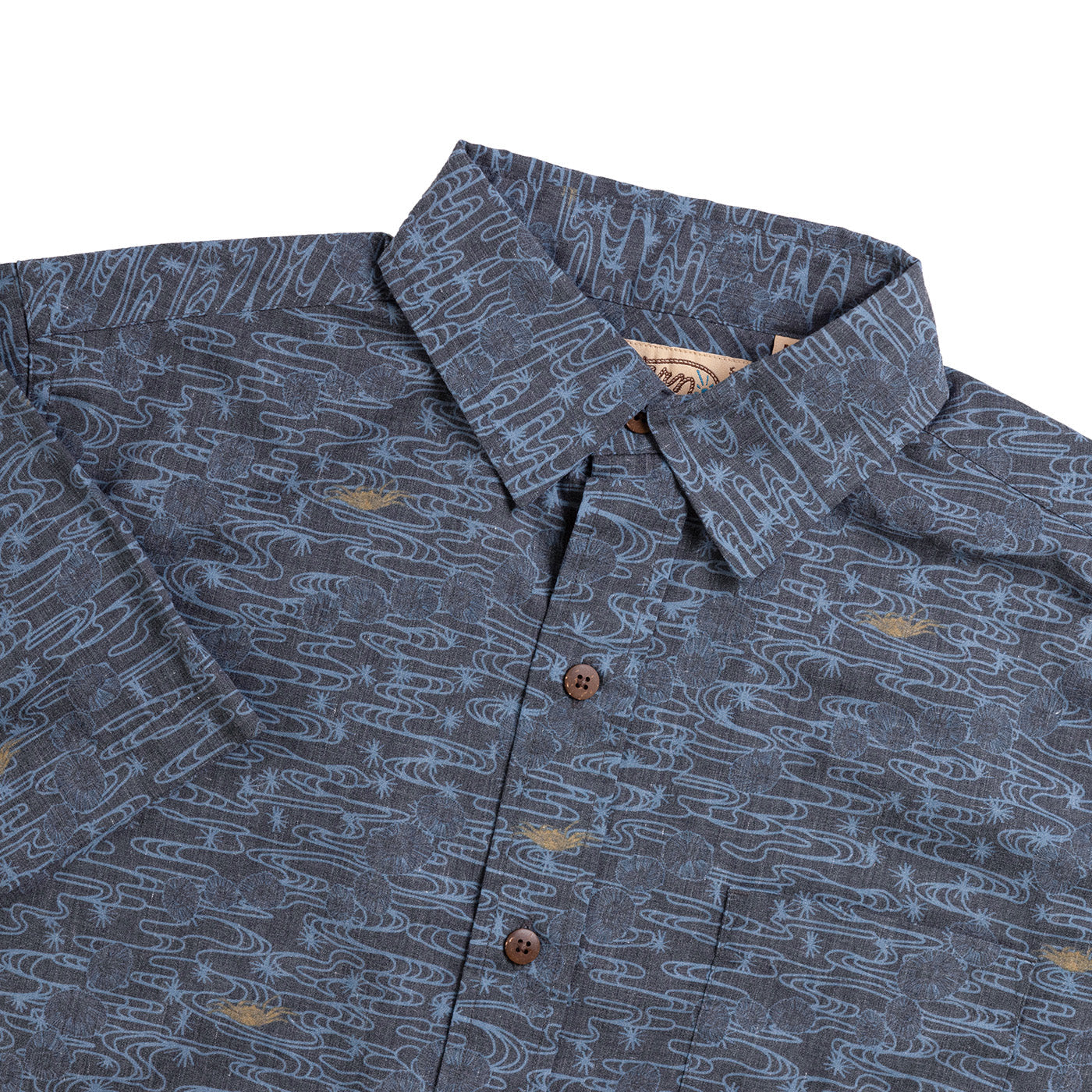 Close-up of a patterned shirt with a collar on a white background