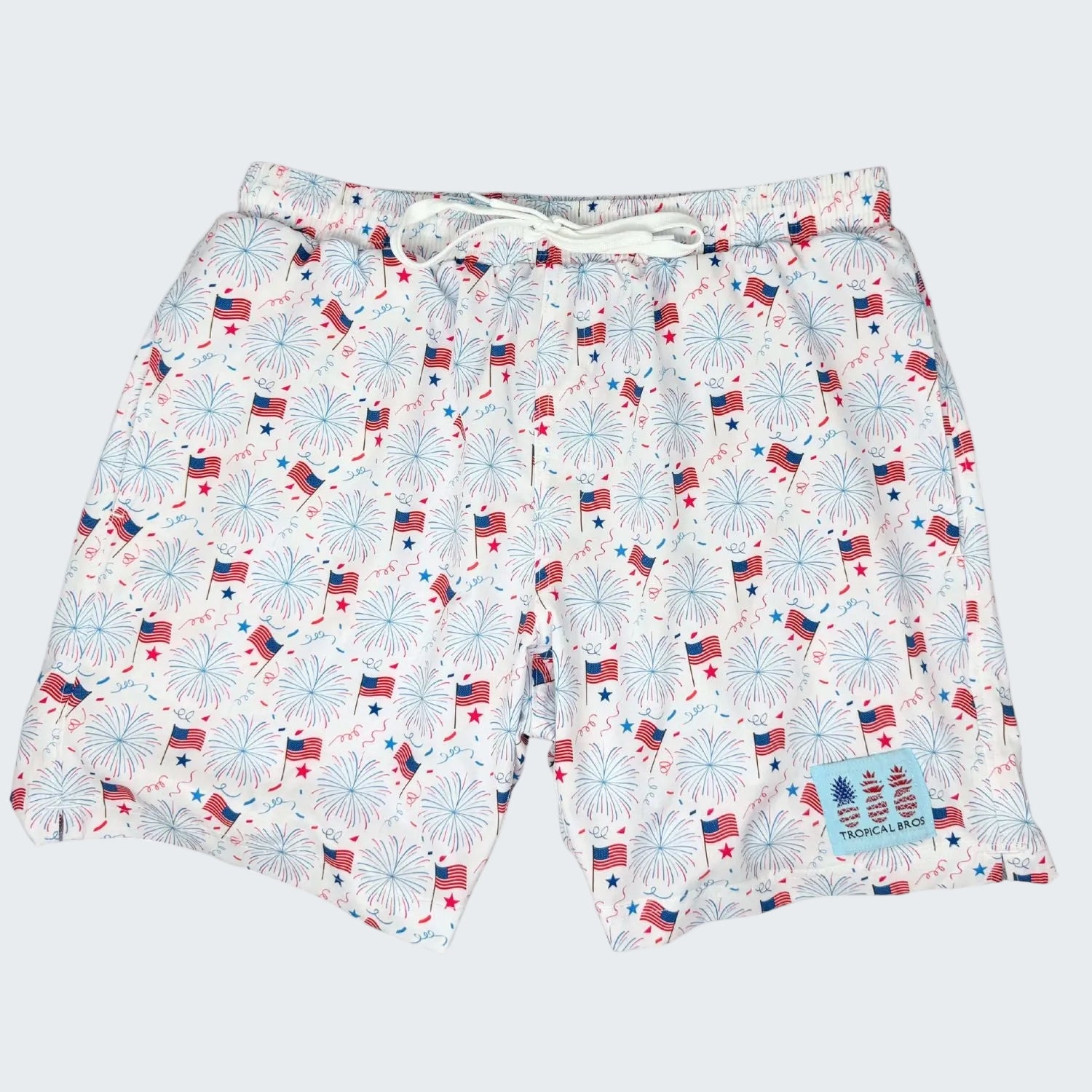Swim shorts with patriotic pattern on a white background, labeled '10 Year Anniversary 2026 Limited Edition'.