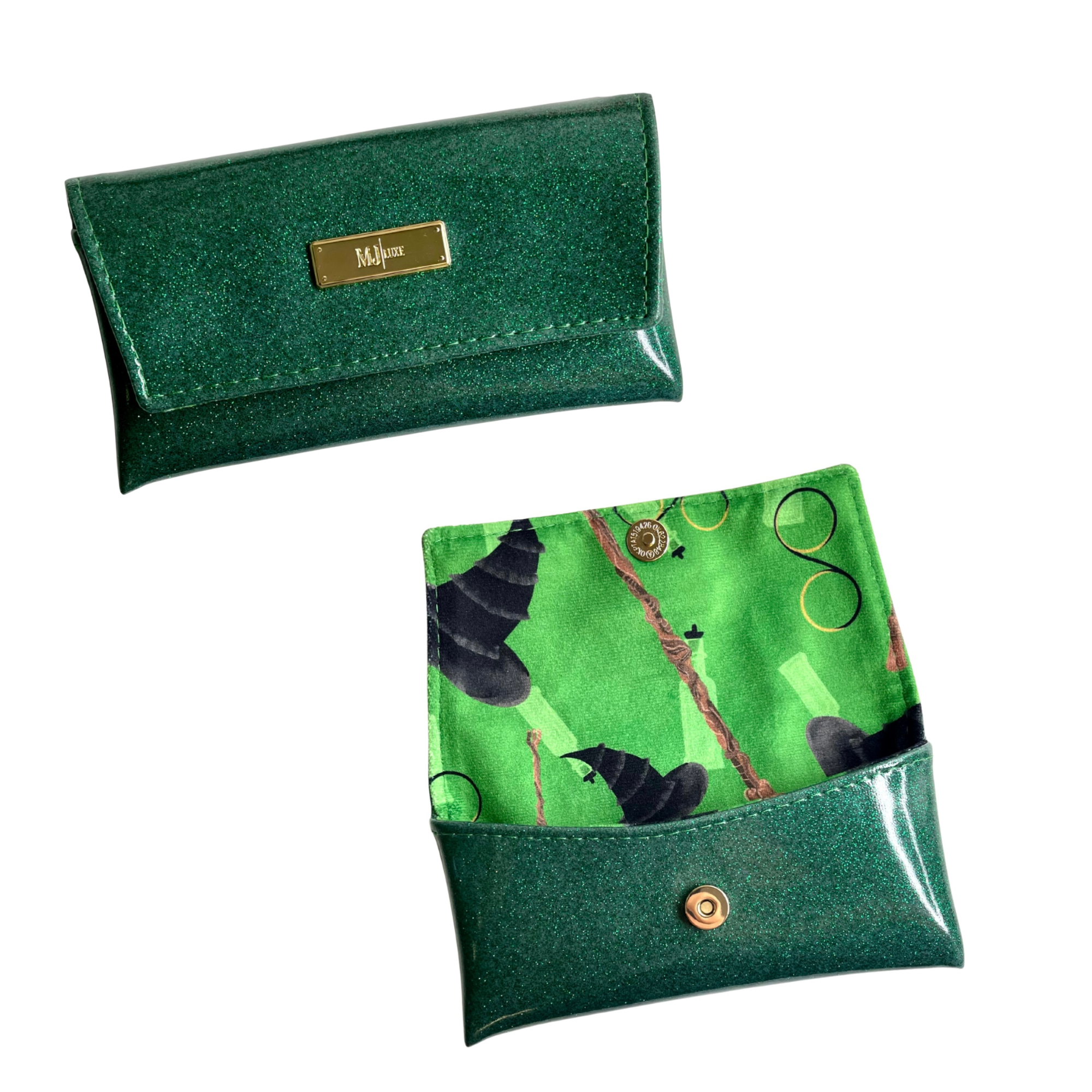 Green fabric pouch with a patterned flap on a white background