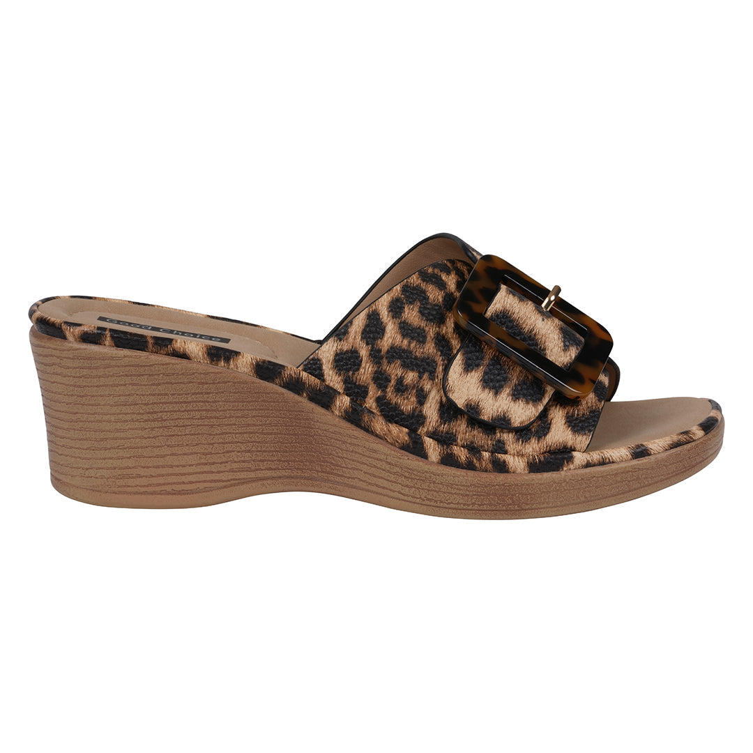Leopard print wedge sandal on a white background