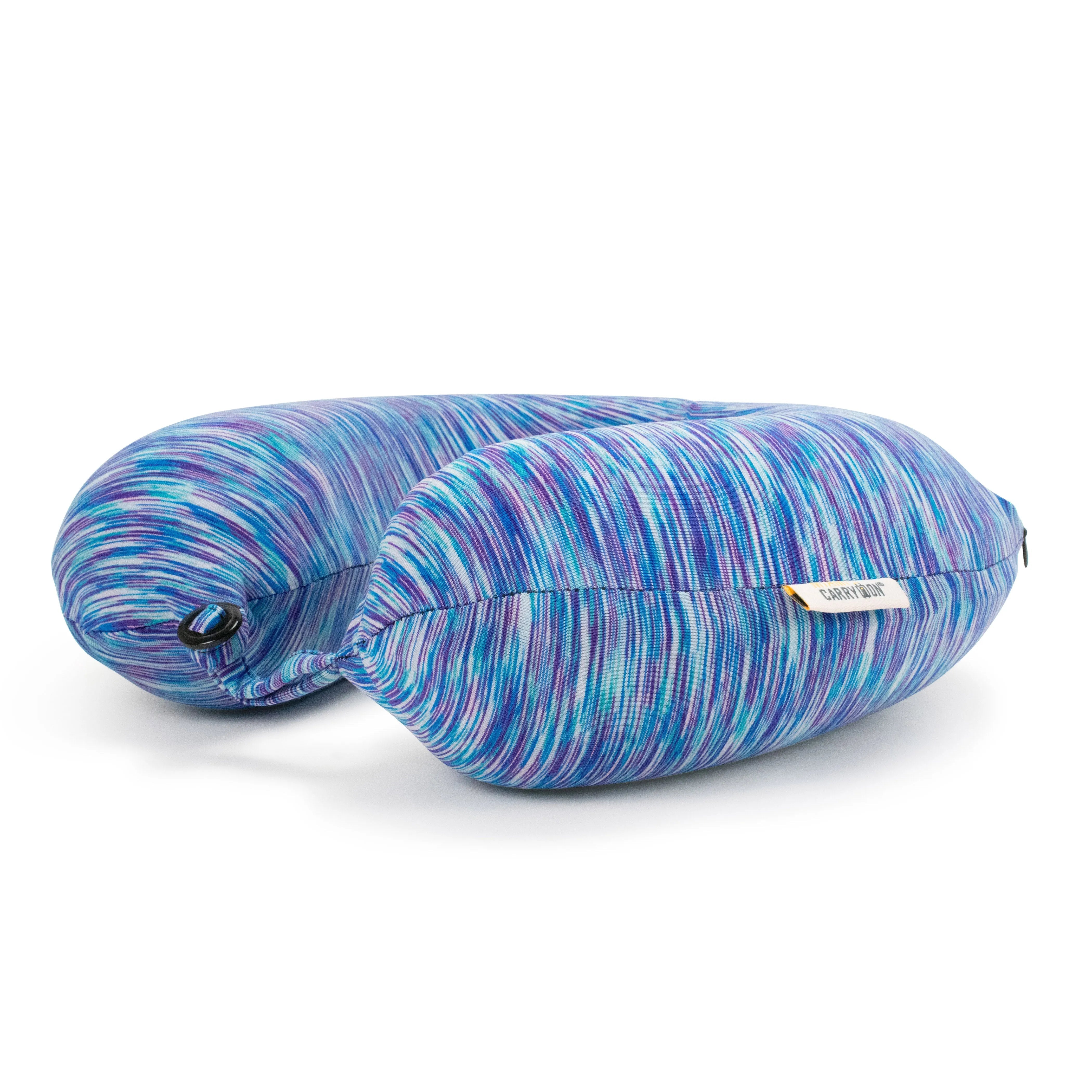 Blue and purple patterned travel pillow on a white background